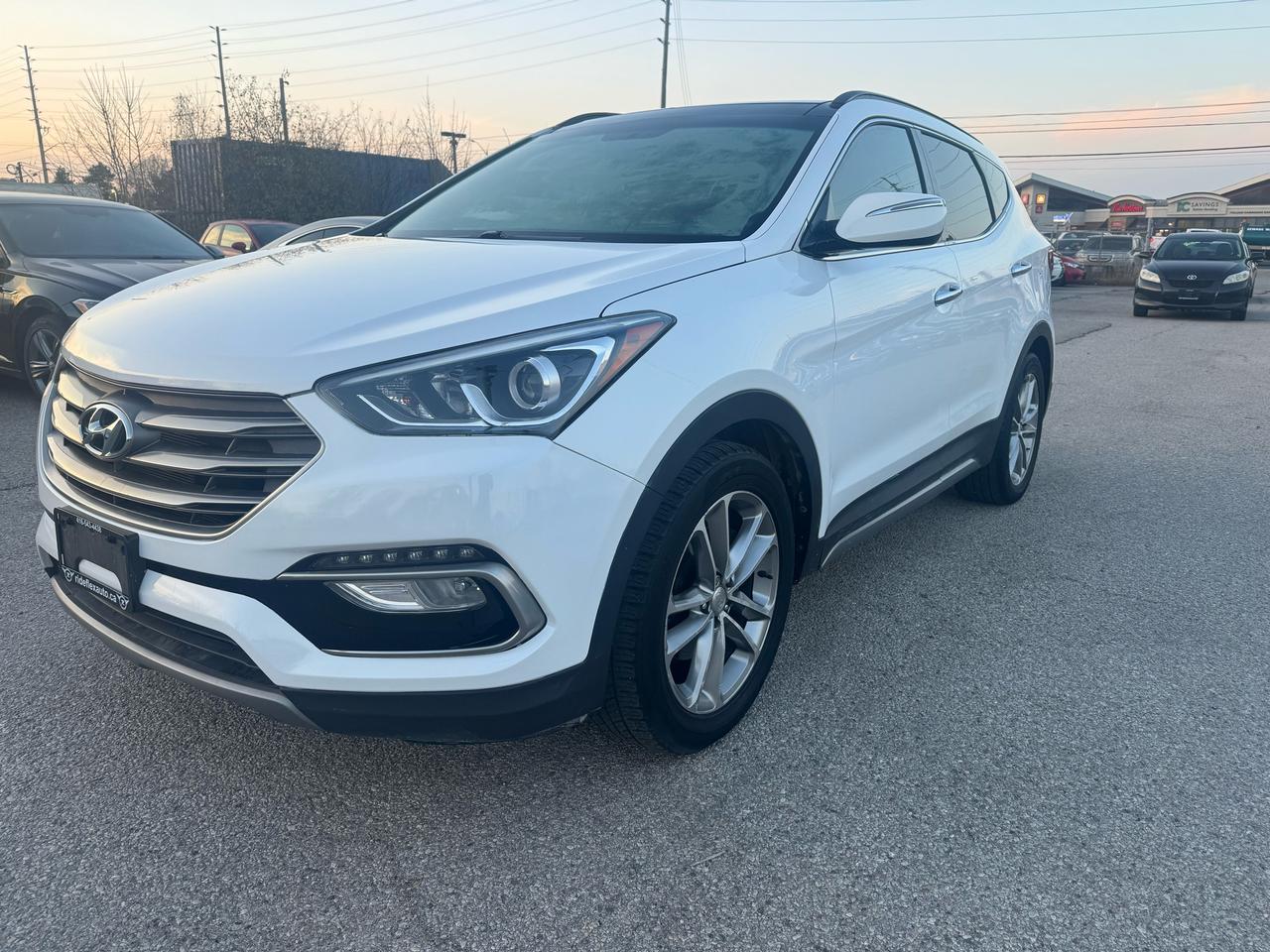 <div>2018 &nbsp;Hyundai Santa Fe Sport Limited AWD comes in excellent condition,,,,,ONE OWNER ONLY,,,,LOW KILOMETRES,,,,,runs & drives like brand new....Fully Loaded, Equipped with Backup Camera, Navigation System, Panoramic Sunroof, Leather interior, Power Steering Wheel, Power mirrors, heated mirrors, Power Seats, heated seats, keyless entry, push start, Power doors lock, Power tailgate, Bluetooth, Cruise Control and much more....Fully certified included in the price, HST & Licensing extra....This vehicle has been serviced in 2019, 2020, 2021 & up to very recent in Hyundai Store....Service records available upon request.........Please contact us @ 4 1 6 5 4 3 4 4 3 8 for more details....At Rideflex Auto we are serving our clients across G.T.A, Toronto, Vaughan, Richmond Hill, Newmarket, Bradford, Markham, Mississauga, Scarborough, Pickering, Ajax, Oakville, Hamilton, Brampton, Waterloo, Burlington, Aurora, Milton, Whitby, Kitchener London, Brantford, Barrie, Milton.......</div><div>Buy with confidence from Rideflex Auto... &nbsp; &nbsp; &nbsp;&nbsp;</div>