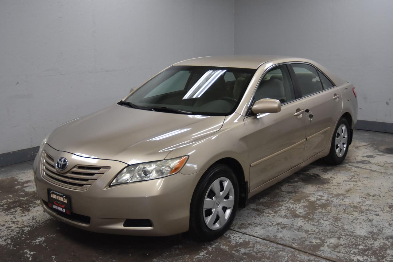2009 Toyota Camry LE - Photo #2