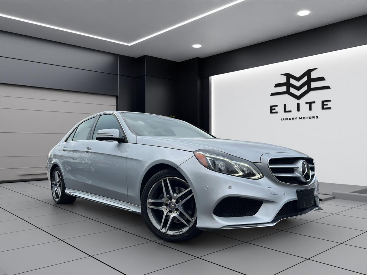 2015 Mercedes-Benz E-Class E400 4MATIC - AMG PKG - NAVI - LEATHER - 71,000KMS !! Photo