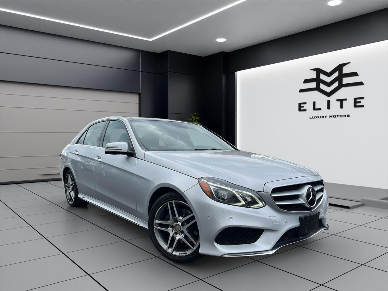 2015 Mercedes-Benz E-Class E400 4MATIC - AMG PKG - NAVI - LEATHER - 71,000KMS !! Photo