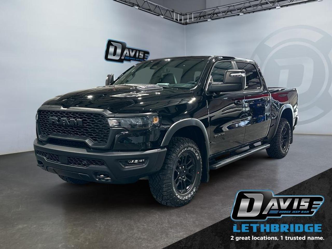 <b>Off-Road Suspension, Navigation, Apple CarPlay, Android Auto, Boxliner, Panoramic Sunroof!<br /> <br /></b><br /> <br /> <br />The 2026 Ram 1500 Rebel in Diamond Black Crystal delivers rugged capability with premium comfort and advanced tech. Powered by a 3.0L I6 Hurricane Twin-Turbo engine and 8-speed automatic transmission with 4x4 drivetrain, it features Rebel-tuned front and rear performance shocks, raised ride height, off-road wheel flares, skid plates, tow hooks, and Class IV receiver hitch, built for off-road adventures and heavy towing.<br /><br />Inside, enjoy luxury leather-trimmed and ventilated front seats, heated second-row seats, dual-zone climate control, full-length upgraded floor console, 8-way power driver and passenger seats with memory, and active noise control. Technology highlights include a Uconnect 5 NAV 14.4 touchscreen, Apple CarPlay, Android Auto, GPS navigation, 19-speaker Harman Kardon premium audio, dual wireless charging, panoramic dual-pane sunroof, and rear passenger interactive display.<br /><br />Safety is comprehensive with Adaptive Cruise Control with Stop & Go, Blind Spot & Cross Path Detection, Active Lane Management, ParkSense Front/Rear Park Assist, Pedestrian Emergency Braking, Traffic Sign Recognition, Intersection Collision Assist, and Evasive Steering Assist. Exterior accents include black Rebel grille, sport performance hood, dual black exhaust tips, accent color tailgate handle, all-aluminum wheels, LED lighting, and Mopar spray-in bedliner.<br /> <br />To apply right now for financing use this link: <a href=https://lethbridge.davisdodge.ca/free-credit-check/ target=_blank rel=nofollow noopener noreferrer>https://lethbridge.davisdodge.ca/free-credit-check/</a><br /><br /> <br /><br />As a premier Chrysler, Dodge, Jeep and RAM dealership, Davis Dodge proudly offers an extensive selection of new and used vehicles to meet every drivers needs. Customers across Lethbridge, Fort Macleod, Taber, Claresholm, Coaldale, and beyond trust us for daily vehicle specials, certified service and parts, and a seamless online inventory experience. <br /><br /> With competitive financing options and expert support, we make car buying easy and enjoyable. <br /><br /> Ready to hit the road? Schedule your test drive today at Davis Dodge, your trusted Chrysler, Dodge, Jeep and RAM dealer in Lethbridge, Alberta.<br /><br /> Vehicle pricing offer shown expires 2026-04-30. <br /> Come by and check out our fleet of 70+ used cars and trucks and 110+ new cars and trucks for sale in Lethbridge. o~o