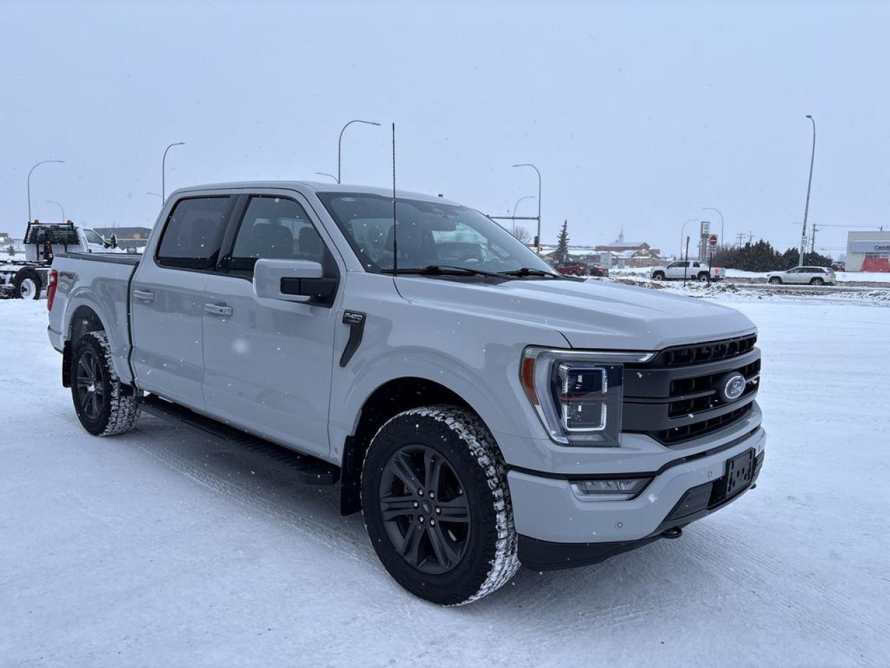 THE PRICE YOU SEE, PLUS GST. GUARANTEED!APPLE CARPLAY/ANDROID AUTO COMPATABLE!2.7 LITER ECOBOOST, 10 SPEED AUTO, LARIAT TRIM(502a), TWIN PANEL MOONROOF, TRAILER TOW PKG, WIRELESS CHARGING PAD, HEATED STEERING WHEEL, HEATED/VENTED FRONT SEATS,HEATED REAR SEATS, FORD PASS CONNECT, SYNC 4/12 INFOTAINMENT DISPLAY, B&O AUDIO.     The 2023 Ford F-150 Lariat with the 2.7-liter EcoBoost engine and the 502A package is a highly capable and feature-rich full-size pickup truck that balances power, technology, and comfort. The 2.7-liter EcoBoost V6 engine delivers an impressive combination of performance and efficiency, producing around 325 horsepower and 400 lb-ft of torque, making it well-suited for towing, hauling, and everyday driving. The 502A package is a premium trim upgrade that includes a wide array of luxurious and convenience features, such as a high-end Bang & Olufsen sound system, a 12-inch touchscreen infotainment system with SYNC 4A, wireless Apple CarPlay and Android Auto, and a digital instrument cluster, all designed to elevate the driving experience. The Lariat trim also offers leather upholstery, heated and ventilated front seats, a power-sliding rear window, and a dual-zone automatic climate control system, emphasizing comfort and sophistication. Under the hood, the truck features advanced towing capabilities, including a trailer brake controller, Pro Trailer Backup Assist, and various driver-assist technologies like adaptive cruise control, lane-keeping assist, and a 360-degree camera system, enhancing safety and ease of use. The exterior design of the 2023 F-150 Lariat is bold and modern, with a rugged yet refined appearance, complemented by 18-inch or optional larger wheels. Overall, this truck combines robust performance with premium amenities, making it an ideal choice for those seeking a versatile, powerful, and well-appointed full-size pickup.Do you want to know more about this vehicle, CALL, CLICK OR COME ON IN!*AMVIC Licensed