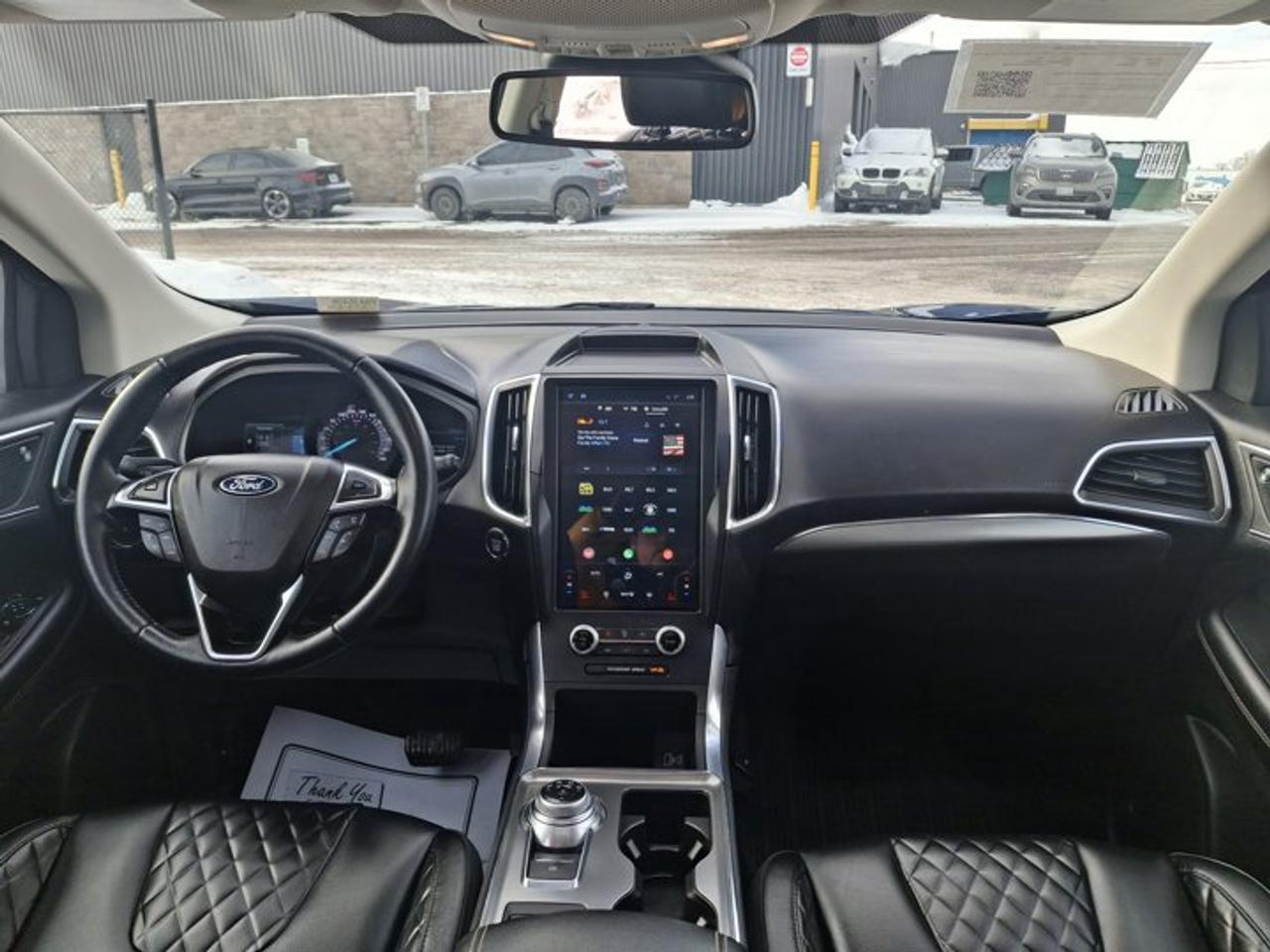 2023 Ford Edge Titanium AWD | Pano Roof | Leather | Heated Wheel + Seats | CarPlay + Android | Rear Cam and More ! Photo