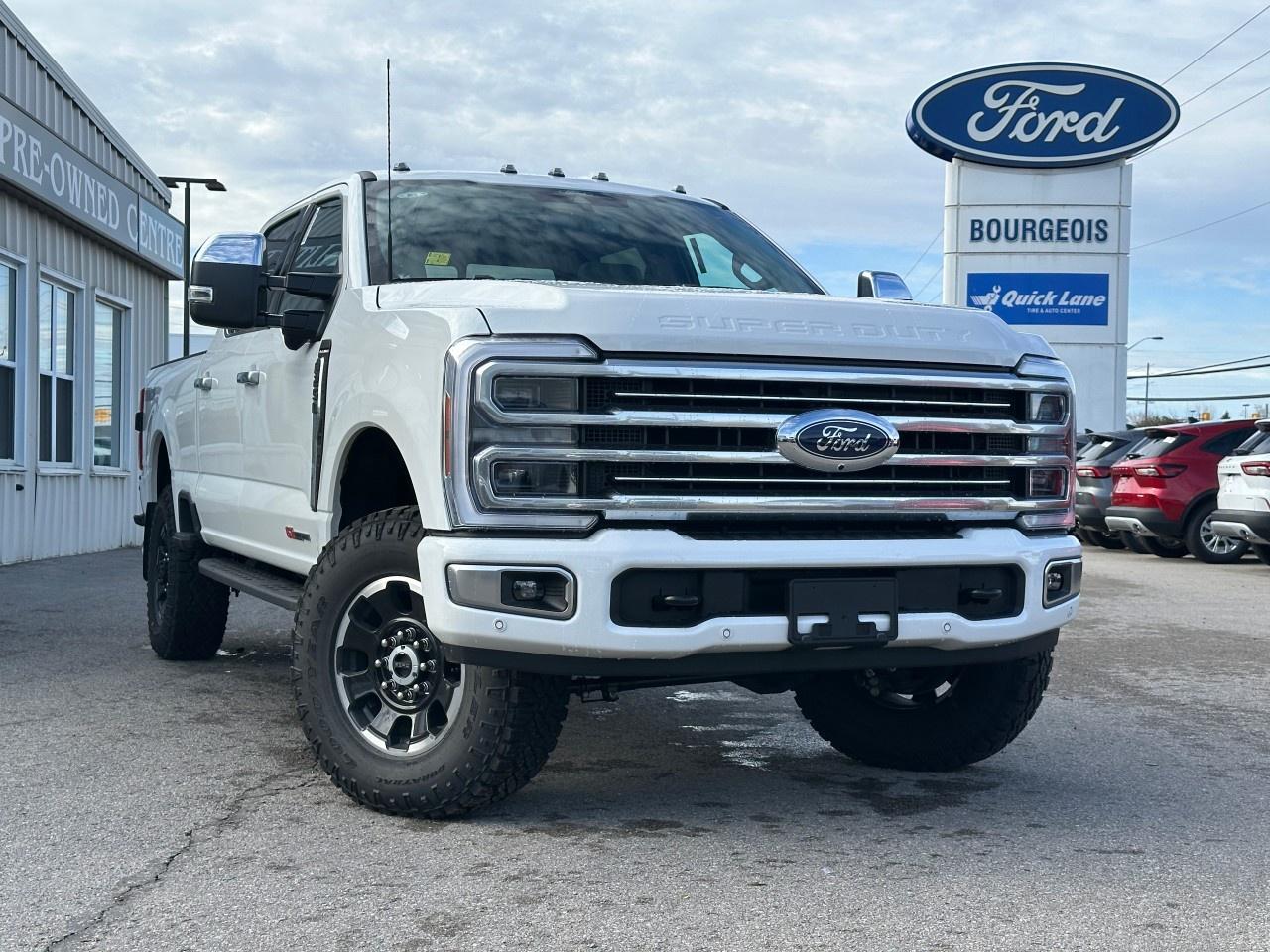 <p>The 2026 Ford Super Duty F-250 SRW Platinum, with its pristine white exterior and a robust 4x4 drive, offers a commanding presence on any road. Designed for those who need strength and reliability, this new truck promises exceptional handling and performance.</p><p>Step inside the Platinum trim, and you'll be welcomed by a luxurious brown interior that perfectly complements its rugged exterior. The truck boasts elegant leather seats, a leather steering wheel, and finely detailed leather door trims. Both front and rear seats come equipped with heating options, ensuring comfort in any weather, while front seats also offer a cooling option to enhance driving pleasure.</p><p>Technology meets convenience with features like bluetooth connection and smart device integration, allowing you to stay safely connected. Enjoy the advancement of a wi-fi hotspot to keep your digital devices online, and rely on brake assist and adaptive cruise control for a safer driving experience.</p><p>This truck is perfect for those who demand both luxury and capability. Whether you're looking to conquer tough terrains or make a statement in the city, the Super Duty F-250 SRW Platinum is your ultimate partner. Contact us today to learn more about this impressive new Ford and schedule a test drive.</p> <p><span style=color:rgb( 58 , 80 , 95 )>The discount shown on vehicle represents the </span><u>Cash Purchase</u><span style=color:rgb( 58 , 80 , 95 )> discount and is inclusive of all non-stackable and stackable cash purchase discounts from Ford of Canada and Bourgeois Motors Ltd. and is offered in lieu of sub-vented lease or finance rates. To get details on current discounts applicable to this and other vehicles in our inventory for Lease and Finance customer, see a member of our team. All offers for lease or finance are On Approved Credit (OAC).While every effort is made to ensure the accuracy of discounts and programs, programs are subject to change without notice </span><span style=color:rgb( 119 , 119 , 119 )>and may not be accurate or completely current. While every reasonable effort is made to ensure the accuracy of this data, we are not responsible for any errors or omissions contained on these pages.</span></p> <p><strong>Why Choose the Bourgeois Auto Group?</strong></p><p>For 80 years, Bourgeois Auto Group has been delivering exceptional automotive experiences. Our factor trained teams work to ensure you receive the shopping experience you deserve; whether you're looking for a new or new-to-you vehicle.</p><p>Shop 24/7 with our online showroom and chat service, ensuring convenience every step of the way. No hidden fees, full disclosure, and every pre-owned vehicle comes with a Carfax® report for peace of mind.</p><p>We offer a wide selection of pre-owned vehicles, all competitively priced using real-time market data. Get the best deal on your purchase and trade-in with our free Live Market Analysis report.</p><p>Looking to sell your car? We buy any make or modelno purchase required. Our simple to use online trade valuation tool will provide you with a clear, transparent selling experience whether you buy our car or not.</p><p>Backed by hundreds dedicated employees across 4 convenient locations, were here to meet all your automotive needs. Visit us in Midland or Parry Sound and explore our inventory or schedule your next service today.</p> <p><strong>Financing Your Next Vehicle with Bourgeois Motors Ford in Midland:</strong></p><p>At Bourgeois Motors Ford, we make financing your next vehicle simple and stress-free! Our team works with trusted lenders to find flexible options tailored to your budget. Drive away with confidenceapply today!</p><p>Take advantage of our online pre-qualification tool, backed by Equifax and TD Bank to find the payment that works for you. Simply <a href=https://www.bourgeoismotors.com/free-credit-check/ rel=nofollow><strong>CLICK HERE</strong></a><strong> </strong>to use our secure online credit tool with no impact to your credit.</p>