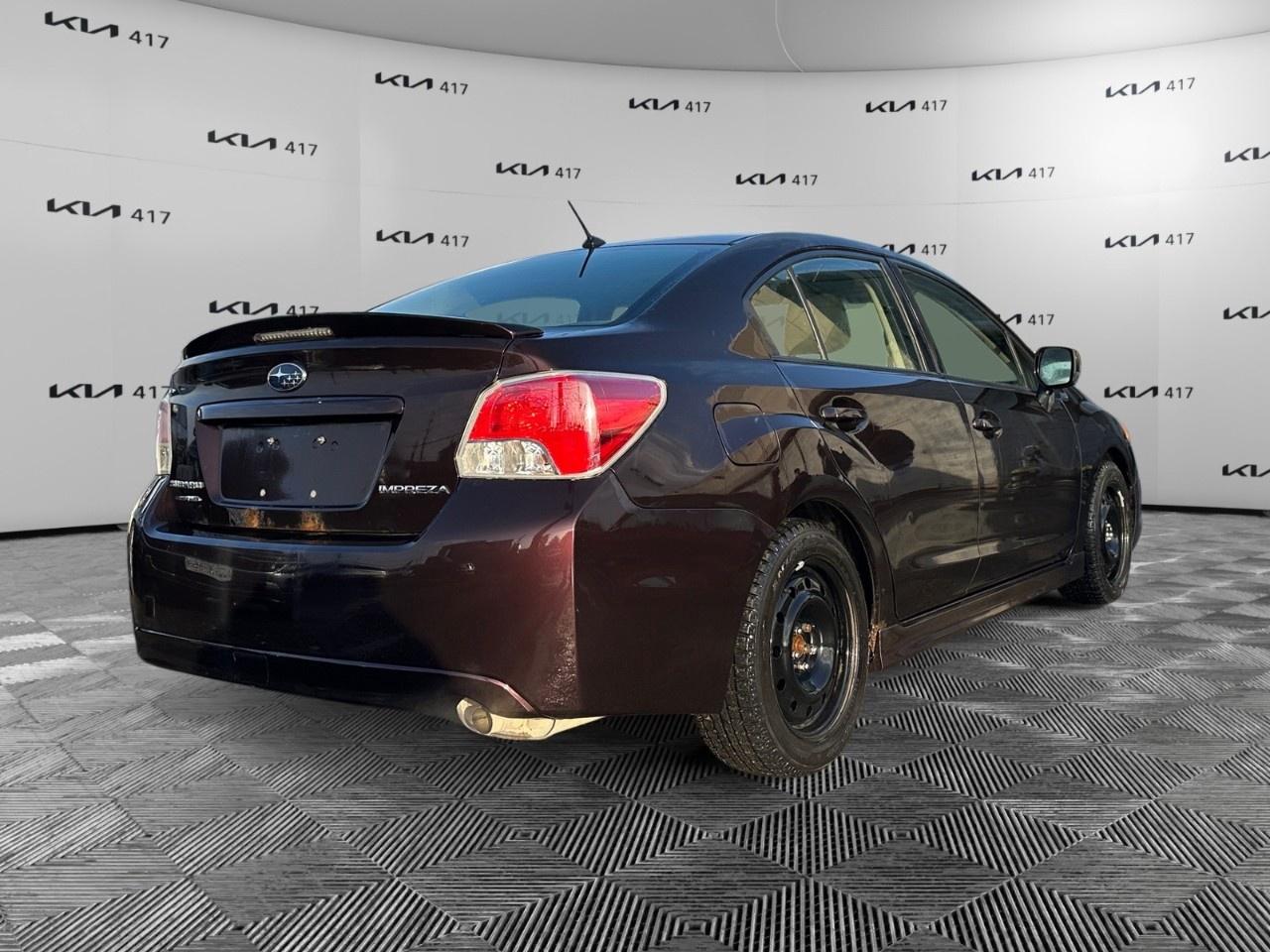 2013 Subaru Impreza 4dr Sdn CVT 2.0i w/Touring Pkg Photo