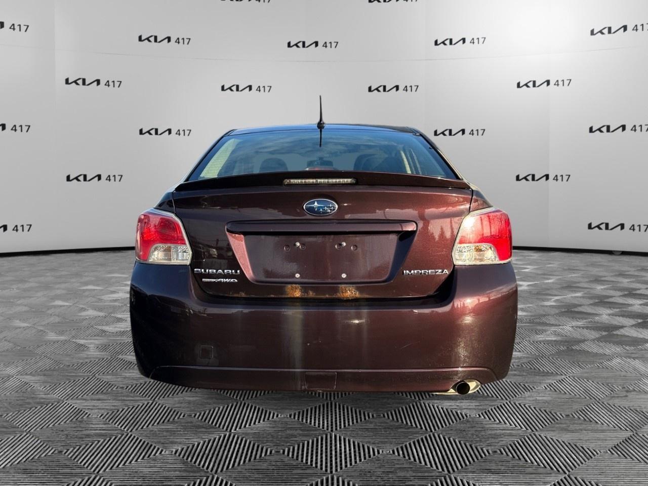 2013 Subaru Impreza 4dr Sdn CVT 2.0i w/Touring Pkg Photo3