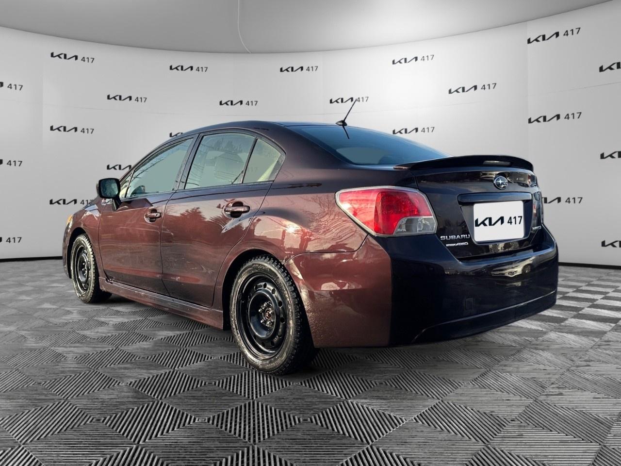 2013 Subaru Impreza 4dr Sdn CVT 2.0i w/Touring Pkg Photo