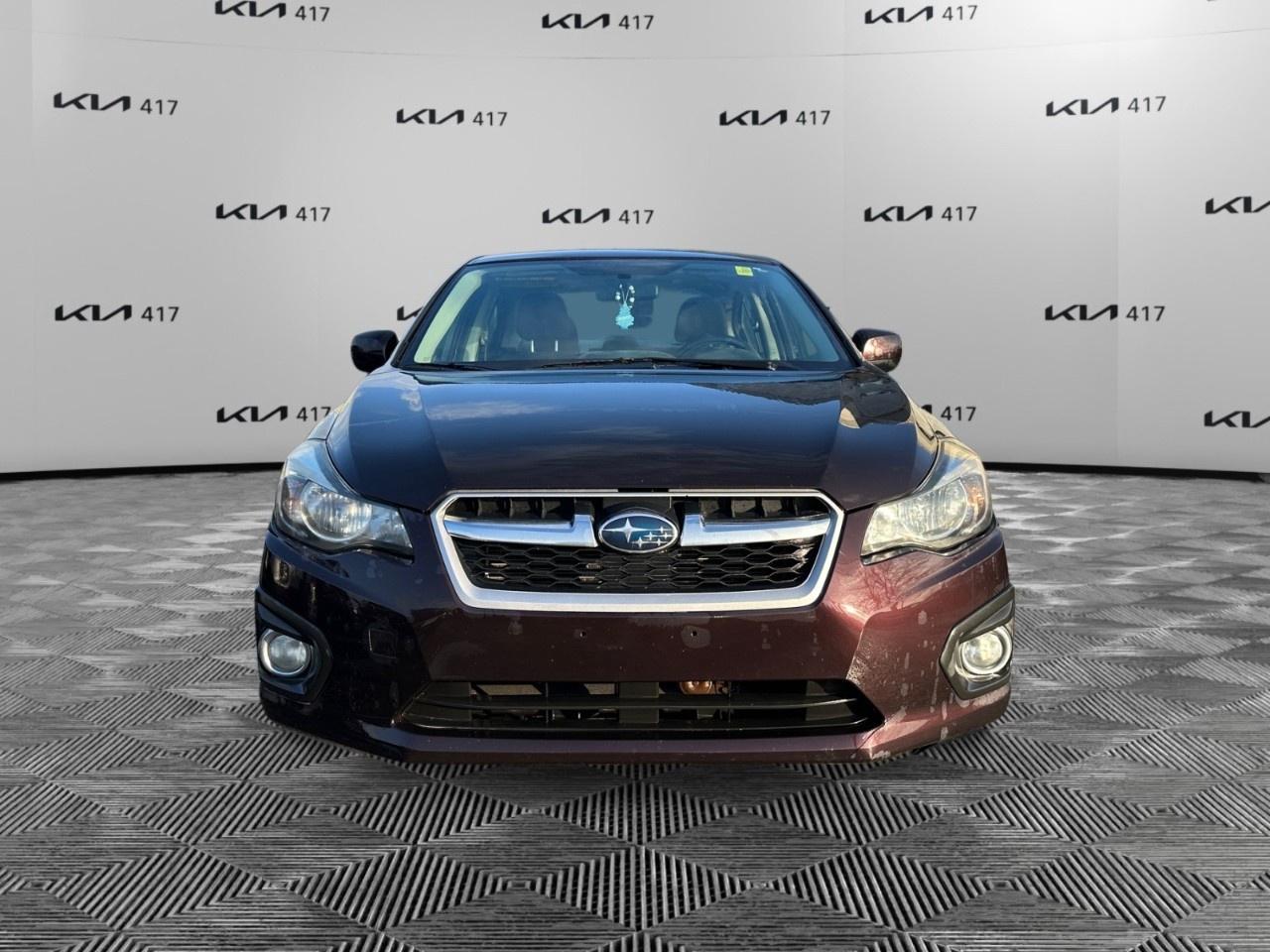 2013 Subaru Impreza 4dr Sdn CVT 2.0i w/Touring Pkg Photo