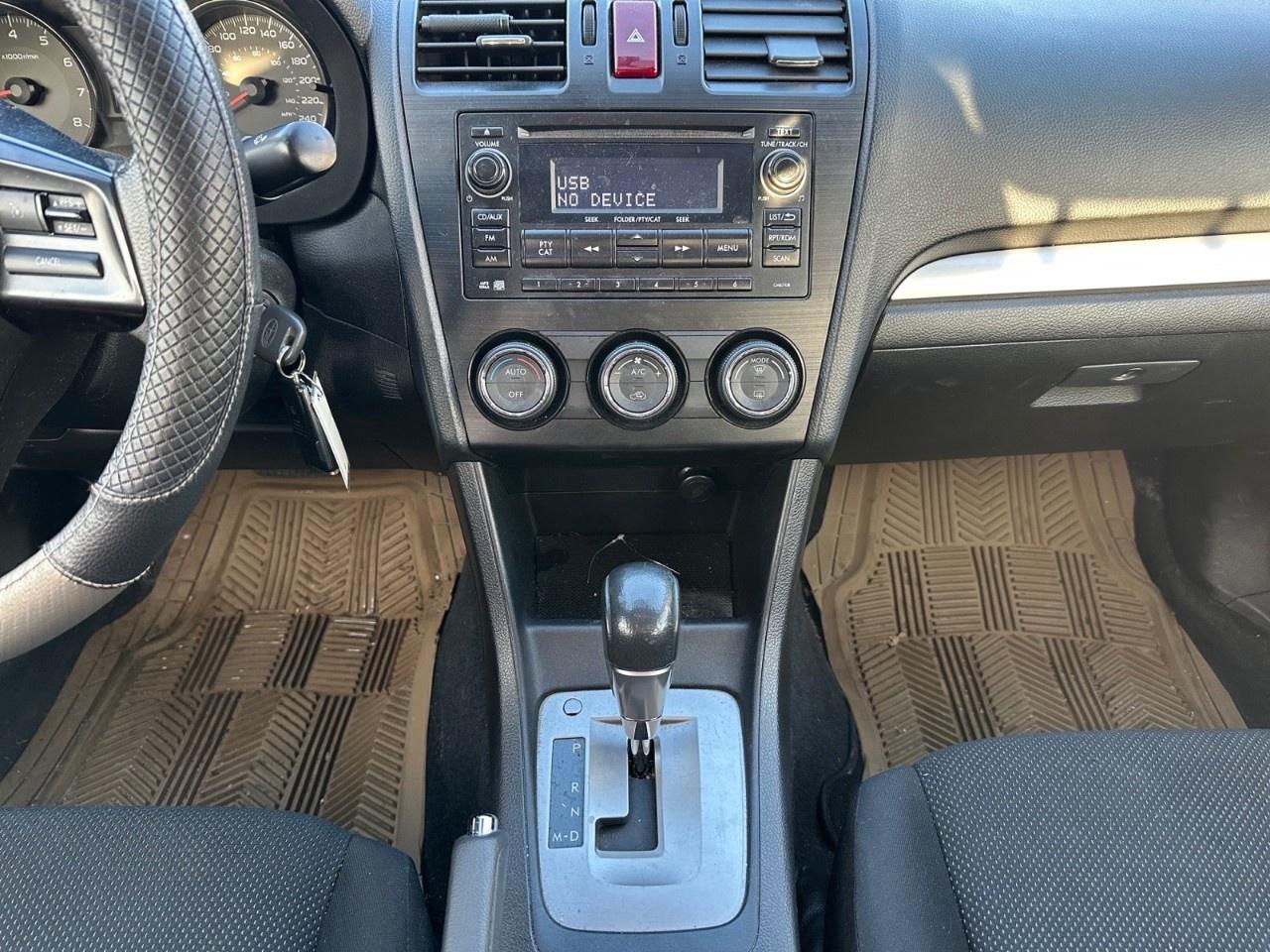 2013 Subaru Impreza 4dr Sdn CVT 2.0i w/Touring Pkg Photo