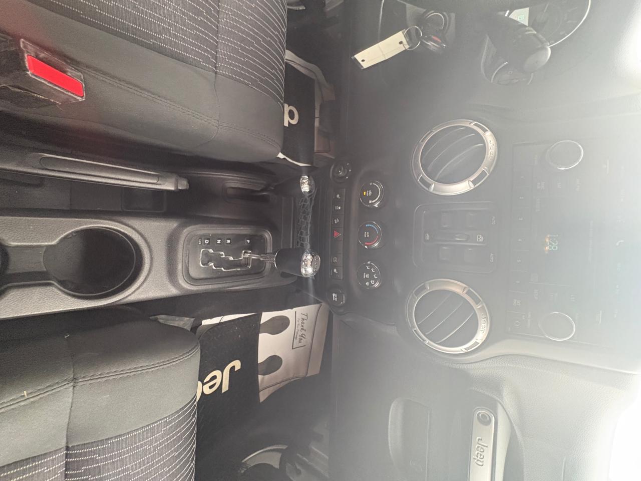 2012 Jeep Wrangler Unlimited Unlimited Sahara – Premium Trim 4x4, No Rust with Safety & Warranty. Financing  Available Photo