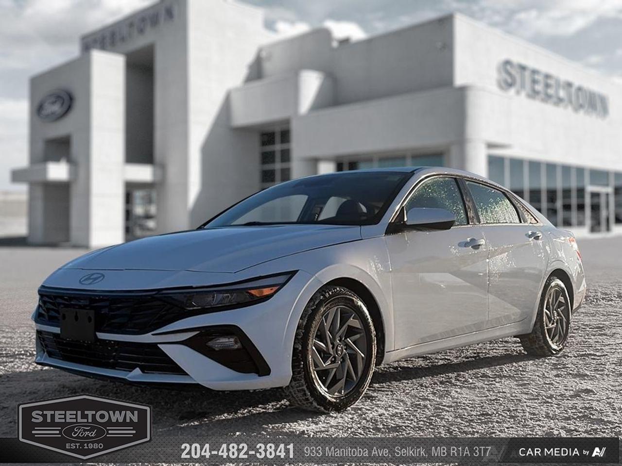 <b>Lane Keep Assist,  Heated Seats,  Android Auto,  Apple CarPlay,  Aluminum Wheels!</b><br> <br> We value your TIME, we wont waste it or your gas is on us!   We offer extended test drives and if you cant make it out to us we will come straight to you!<br><br><br> <br>This bold Hyundai Elantra is bringing excitement to this narrowing class of cars. This 2024 Hyundai Elantra is for sale today in Selkirk. <br> <br>This 2024 Elantra was made to be the sharpest compact sedan on the road. With tons of technology packed into the spacious and comfortable interior, along with bold and edgy styling inside and out, this family sedan makes the unexpected your daily driver. This sedan has 70,455 km. Its White in colour. It has an Automatic transmission and is powered by a 147HP 2.0L 4 Cylinder Engine. <br> <br> Our Elantras trim level is Preferred IVT. This Preferred Elantra is a great choice if you want a more convenient car that comes with proximity keys that allow hands free cargo access, and a safer drive with blind spot and rear collision assist. This Elantra is also equipped with an advanced safety suite including lane keep assist, forward collision assist, driver monitoring, and automatic highbeams. The incredible feature list continues with heated power seats for comfort while voice activated, touch screen infotainment including wireless connectivity with Android Auto, Apple CarPlay, and Bluetooth keeps you connected. Aluminum wheels and gorgeous styling make sure you stand out in a crowd while heated power side mirrors, remote keyless entry, and a rear view camera make every day easier. This vehicle has been upgraded with the following features: Lane Keep Assist, Heated Seats, Android Auto, Apple CarPlay, Aluminum Wheels, Remote Keyless Entry, Touch Screen.<br> <br>To apply right now for financing use this link: <a href=http://www.steeltownford.com/?https://CreditOnline.dealertrack.ca/Web/Default.aspx?Token=bf62ebad-31a4-49e3-93be-9b163c26b54c&La target=_blank>http://www.steeltownford.com/?https://CreditOnline.dealertrack.ca/Web/Default.aspx?Token=bf62ebad-31a4-49e3-93be-9b163c26b54c&La</a><br><br> <br/><br>Family owned and operated in Selkirk for 35 Years.  <br>Steeltown Ford is located just 20 minutes North of the Perimeter Hwy, with an onsite banking center that offers free consultations. <br>Ask about our special dealer rates available through all major banks and credit unions.<br><br><br>Steeltown Ford Protect Plus includes:<br>- Life Time Tire Warranty <br>Cars cost less in Selkirk <br><br>Dealer Permit # 1039<br><br><br> Come by and check out our fleet of 100+ used cars and trucks and 150+ new cars and trucks for sale in Selkirk.  o~o