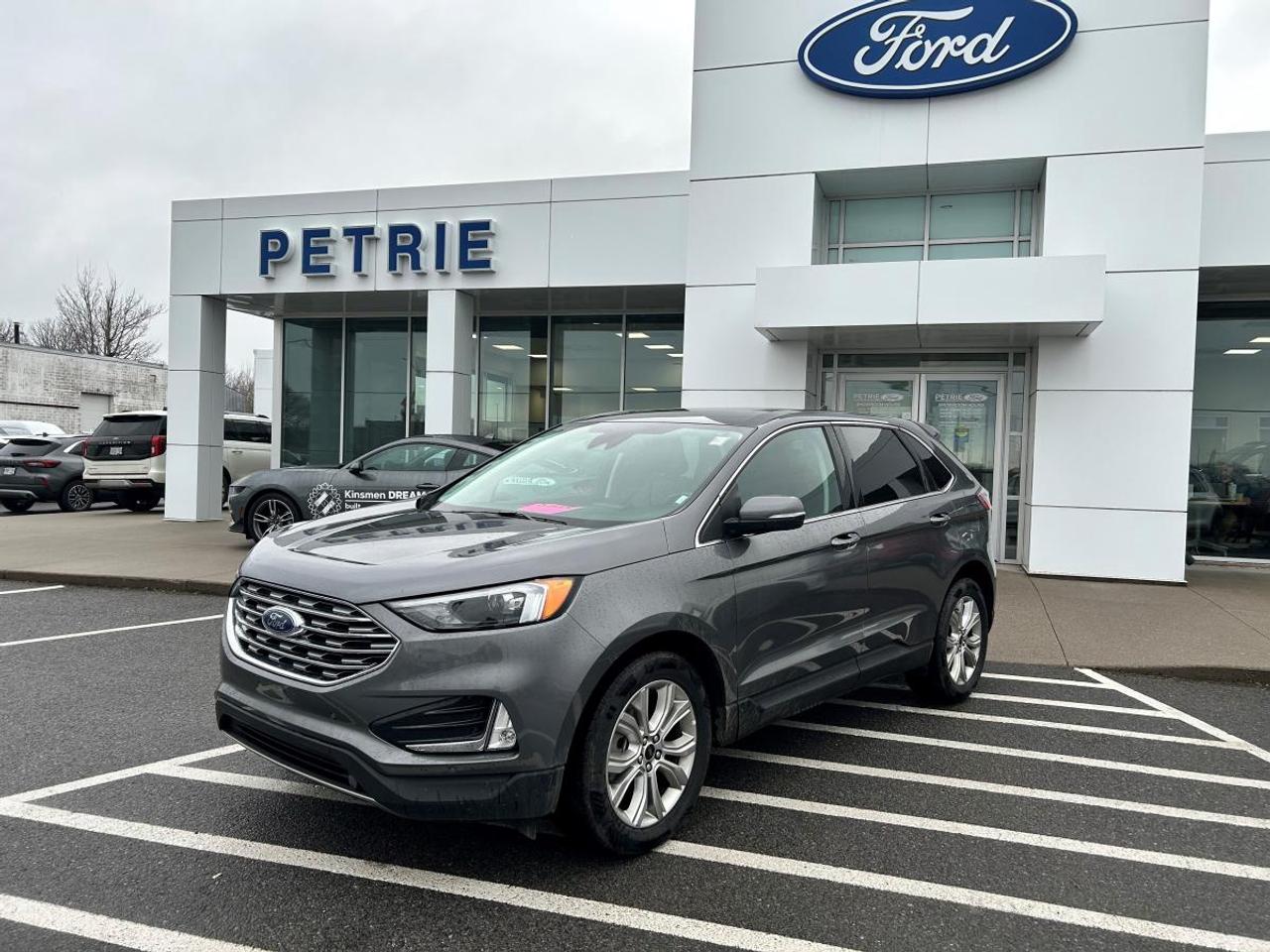 Go further! Here is a 2023 Ford Edge Titanium. Powered by a 2.0L ecoboost engine with an 8-speed automatic transmission that delivers impressive performance and smooth handling. The 2023 Ford Edge Titanium features comfortable seating, modern tech features and prioritizes safety. Adventure is calling, come check out the 2023 Ford Edge Titanium today! Key Features: >> Equipment group 300A >> Rain sensing wipers >> Remote vehicle start >> Universal garage door opener >> Reverse camera system >> Rear privacy glass >> Wireless charging pad >> B&O audio system >> Lane keeping system >> Safety canopy >> Personal safety system >> Tire pressure monitoring system >> 110V outlet >> Cruise control >> FORDPASS CONNECT and so much more! *Previous daily rental* This 2023 Ford Edge Titanium is available now at Petrie Ford. We are located at 1388 Bath Road in Kingston, Ontario. Come schedule a test drive today!<p>Go further! Here is a 2023 Ford Edge Titanium. Powered by a 2.0L ecoboost engine with an 8-speed automatic transmission that delivers impressive performance and smooth handling. The 2023 Ford Edge Titanium features comfortable seating</p>
<p> come check out the 2023 Ford Edge Titanium today! Key Features: >> Equipment group 300A >> Rain sensing wipers >> Remote vehicle start >> Universal garage door opener >> Reverse camera system >> Rear privacy glass >> Wireless charging pad >> B&O audio system >> Lane keeping system >> Safety canopy >> Personal safety system >> Tire pressure monitoring system >> 110V outlet >> Cruise control >> FORDPASS CONNECT and so much more! *Previous daily rental* This 2023 Ford Edge Titanium is available now at Petrie Ford. We are located at 1388 Bath Road in Kingston</p>