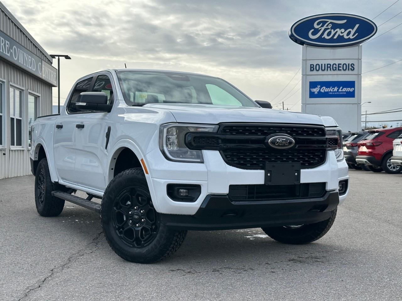 <p>Step into the future with the 2025 Ford Ranger XLT, a pristine white 4x4 truck that promises unparalleled handling. Whether you're navigating city streets or tackling rugged terrain, the Ranger's superb drivetrain keeps you confidently in control.</p> <p>The Ford Ranger XLT showcases an impressive presence with its bold exterior, perfectly complemented by the elegant black interior. Enjoy refined touches with leatherette materials embellishing both the steering wheel and gear shifter, alongside a suite of modern conveniences.</p> <p>Technologically advanced, the Ranger boasts a massive 12" display in the center stack, ensuring all your controls are easily accessible. Stay connected on every journey with Bluetooth connectivity, smart device integration, and a Wi-Fi hotspot. Safety takes the front seat with features like a backup camera, lane assist, and parking sensors, providing peace of mind on every drive.</p> <p>This truck is perfect for adventurers and urban explorers alike. Whether you're hitting the open road or managing daily tasks, the 2025 Ford Ranger XLT is designed to elevate your experience. Contact our dealership today to learn more about how you can make this incredible vehicle yours.</p> <p><span style=color:rgb( 58 , 80 , 95 )>The discount shown on vehicle represents the </span><u>Cash Purchase</u><span style=color:rgb( 58 , 80 , 95 )> discount and is inclusive of all non-stackable and stackable cash purchase discounts from Ford of Canada and Bourgeois Motors Ltd. and is offered in lieu of sub-vented lease or finance rates. To get details on current discounts applicable to this and other vehicles in our inventory for Lease and Finance customer, see a member of our team. All offers for lease or finance are On Approved Credit (OAC).While every effort is made to ensure the accuracy of discounts and programs, programs are subject to change without notice </span><span style=color:rgb( 119 , 119 , 119 )>and may not be accurate or completely current. While every reasonable effort is made to ensure the accuracy of this data, we are not responsible for any errors or omissions contained on these pages.</span></p> <p><strong>Why Choose the Bourgeois Auto Group?</strong></p><p>For 80 years, Bourgeois Auto Group has been delivering exceptional automotive experiences. Our factor trained teams work to ensure you receive the shopping experience you deserve; whether you're looking for a new or new-to-you vehicle.</p><p>Shop 24/7 with our online showroom and chat service, ensuring convenience every step of the way. No hidden fees, full disclosure, and every pre-owned vehicle comes with a Carfax® report for peace of mind.</p><p>We offer a wide selection of pre-owned vehicles, all competitively priced using real-time market data. Get the best deal on your purchase and trade-in with our free Live Market Analysis report.</p><p>Looking to sell your car? We buy any make or modelno purchase required. Our simple to use online trade valuation tool will provide you with a clear, transparent selling experience whether you buy our car or not.</p><p>Backed by hundreds dedicated employees across 4 convenient locations, were here to meet all your automotive needs. Visit us in Midland or Parry Sound and explore our inventory or schedule your next service today.</p> <p><strong>Financing Your Next Vehicle with Bourgeois Motors Ford in Midland:</strong></p><p>At Bourgeois Motors Ford, we make financing your next vehicle simple and stress-free! Our team works with trusted lenders to find flexible options tailored to your budget. Drive away with confidenceapply today!</p><p>Take advantage of our online pre-qualification tool, backed by Equifax and TD Bank to find the payment that works for you. Simply <a href=https://www.bourgeoismotors.com/free-credit-check/ rel=nofollow><strong>CLICK HERE</strong></a><strong> </strong>to use our secure online credit tool with no impact to your credit.</p>