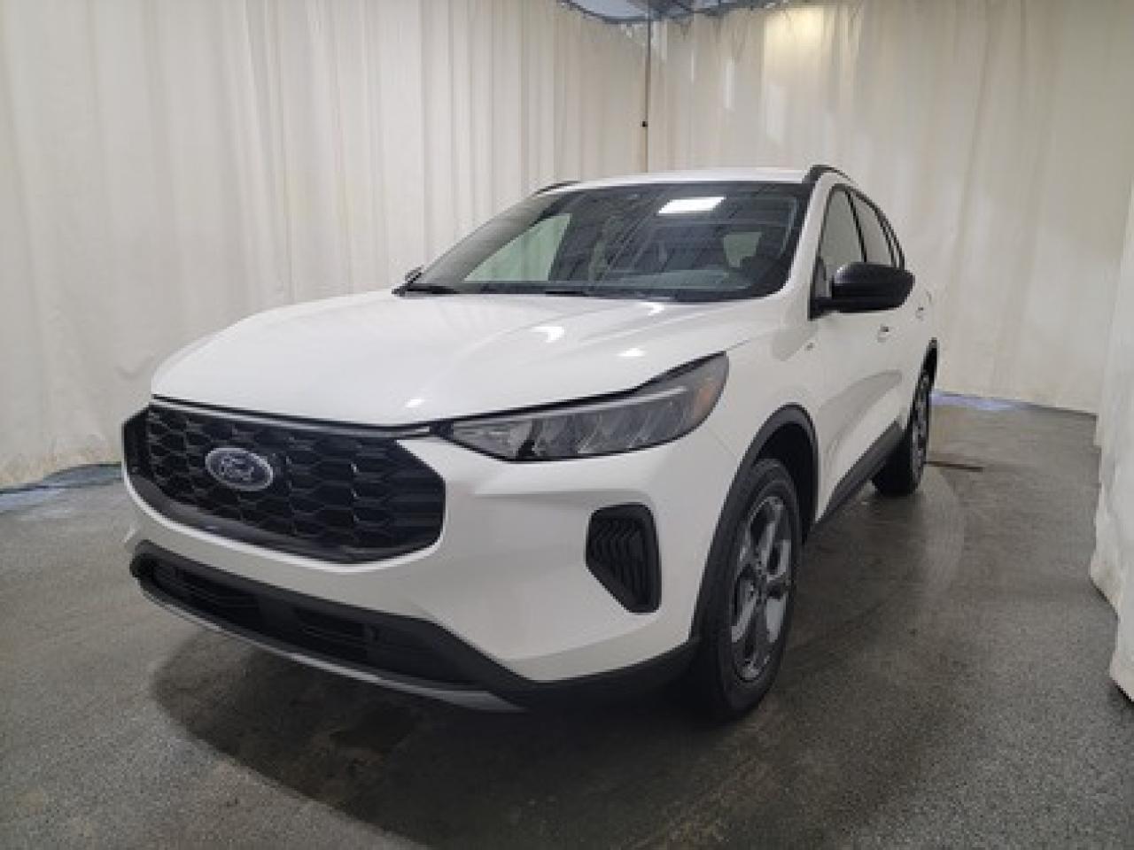 This all-new 2026 Escape ST-Line 300A looks absolutely stunning in Star White Metallic Tri-Coat. This 5-passenger all-wheel drive crossover is equipped with the 1.5L EcoBoost® engine. This remarkable engine not only produces 181 horsepower and 190 ft-lbs of torque, but by leveraging EcoBoost® technology and an 8-speed automatic transmission, this crossover is rated to get an estimated 8.4L/100km (34 miles per gallon) combined highway/city fuel economy.

Key Features:
All Weather Package
Heated Front Seats
Heated Premium Wrapped Sport Steering Wheel
Heated Mirrors
Remote Start
18 Rock Metallic Painted Aluminum Wheels
8-Way Power Driver Seat
Power Windows
LED Headlamps
LED Taillamps
Ford Co-Pilot360
SYNC® 4 W/8 LCD Capacitive Touchscreen
Wireless Apple CarPlay® and Android Auto Compatibility
Mini Spare Wheel/Tire

Saskatchewan has a challenging climate, but the Escape ST-Line is a tough SUV designed with features and technology to keep you comfortable and safe. This specific vehicle is loaded with 4-wheel disc brakes, 18 all season tires, Dual zone electronic climate control, AdvanceTrac® with RSC® (Roll Stability Control), AWD, BLIS® (Blind Spot Information System) with Cross-Traffic Alert with Braking, Active Grille Shutters, Privacy Glass, Pedestrian Detection, Dynamic Brake Support, and more, ensuring you're prepared for any journey.

Bennett Dunlop Ford, proudly serving Regina for over 40 years, is conveniently located at 770 Broad Street. With over 3,500 Google reviews, our reputation reflects our commitment to providing a fast, easy, and enjoyable vehicle-buying experience. We eliminate the hassle with no admin or documentation fees, transparent upfront pricing that lets you shop with total confidence. But were more than just a dealershipwere driven to make a difference by supporting local community initiatives and events that matter to you. Visit Bennett Dunlop Ford today and experience why were Reginas trusted choice for quality vehicles, exceptional service, and a genuine commitment to driving change in our community!