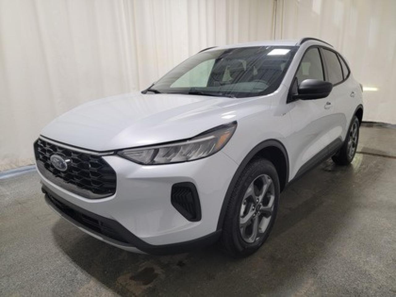 This all-new 2026 Escape ST-Line 300A looks absolutely stunning in Space Silver Metallic. This 5-passenger all-wheel drive crossover is equipped with the 1.5L EcoBoost® engine. This remarkable engine not only produces 181 horsepower and 190 ft-lbs of torque, but by leveraging EcoBoost® technology and an 8-speed automatic transmission, this crossover is rated to get an estimated 8.4L/100km (34 miles per gallon) combined highway/city fuel economy.

Key Features:
All Weather Package
Heated Front Seats
Heated Premium Wrapped Sport Steering Wheel
Heated Mirrors
Remote Start
18 Rock Metallic Painted Aluminum Wheels
8-Way Power Driver Seat
Power Windows
LED Headlamps
LED Taillamps
Ford Co-Pilot360
SYNC® 4 W/8 LCD Capacitive Touchscreen
Wireless Apple CarPlay® and Android Auto Compatibility
Mini Spare Wheel/Tire

Saskatchewan has a challenging climate, but the Escape ST-Line is a tough SUV designed with features and technology to keep you comfortable and safe. This specific vehicle is loaded with 4-wheel disc brakes, 18 all season tires, Dual zone electronic climate control, AdvanceTrac® with RSC® (Roll Stability Control), AWD, BLIS® (Blind Spot Information System) with Cross-Traffic Alert with Braking, Active Grille Shutters, Privacy Glass, Pedestrian Detection, Dynamic Brake Support, and more, ensuring you're prepared for any journey.

Bennett Dunlop Ford, proudly serving Regina for over 40 years, is conveniently located at 770 Broad Street. With over 3,500 Google reviews, our reputation reflects our commitment to providing a fast, easy, and enjoyable vehicle-buying experience. We eliminate the hassle with no admin or documentation fees, transparent upfront pricing that lets you shop with total confidence. But were more than just a dealershipwere driven to make a difference by supporting local community initiatives and events that matter to you. Visit Bennett Dunlop Ford today and experience why were Reginas trusted choice for quality vehicles, exceptional service, and a genuine commitment to driving change in our community!