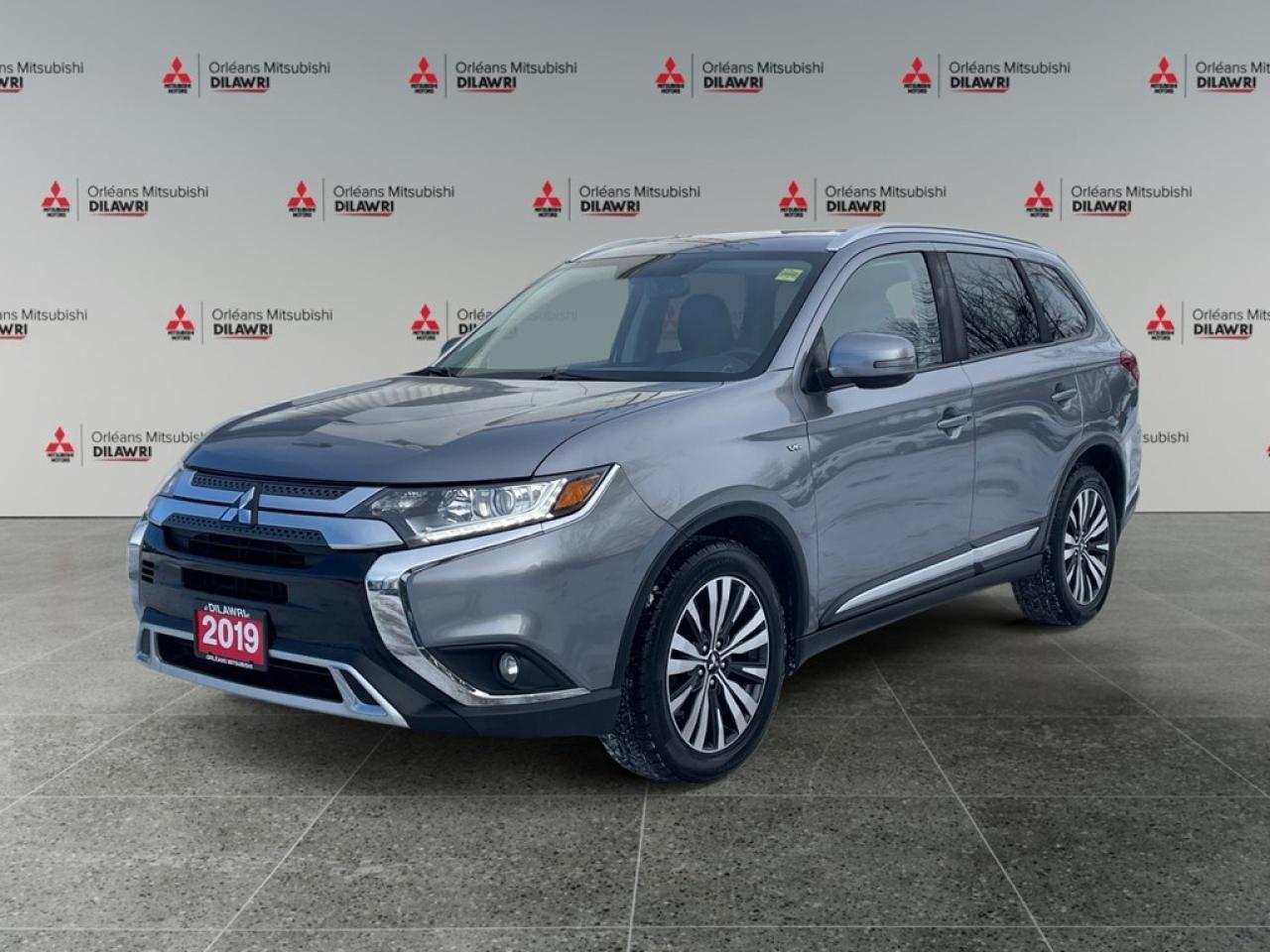 The 2019 Mitsubishi Outlander SE AWC in a refined gray finish combines robust 4x4 capabilities with exceptional handling, making it an ideal choice for those who crave both adventure and style in an SUV. The exterior design of the Outlander is both modern and functional, featuring alloy wheels that enhance its aesthetic appeal. Inside, youll find a thoughtfully designed interior with comfortable heated seats, offering a relaxing environment for both driver and passengers. The intuitive layout and quality materials contribute to a sophisticated driving experience. Technologically advanced, the Outlander comes equipped with a range of features to enhance your driving experience. Stay connected on the go with smart device integration and a Bluetooth connection. The backup camera and brake assist provide added safety, while the satellite radio keeps you entertained during your journeys. Perfect for families and outdoor enthusiasts alike, the Mitsubishi Outlander SE AWC is ready to meet your lifestyle needs. Contact us today to learn more and experience this versatile SUV firsthand. Your ultimate driving adventure awaits! **ADVERTISED SALE PRICE IS BASED ON FINANCE PURCHASE**