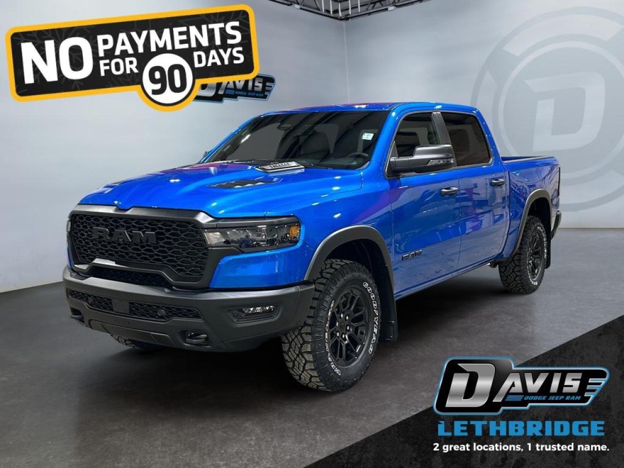 <b>Off-Road Suspension, Navigation, Apple CarPlay, Android Auto, Blind Spot Monitoring!<br /> <br /></b><br /> <br /> <br />The 2026 Ram 1500 Rebel in Hydro Blue Pearl Coat delivers off-road dominance and bold styling. Powered by a 3.0L I6 Twin-Turbo Hurricane engine paired with an 8-speed automatic transmission and 4x4 drivetrain, it features raised ride height, E-locker rear axle, off-road wheel flares, and dual exhaust with black tips for unmatched capability and presence.<br /><br />Inside, enjoy heated cloth/vinyl bucket seats, full-length upgraded floor console, dual-zone climate control, 12 Uconnect 5 NAV touchscreen, Apple CarPlay, Android Auto, and GPS navigation. The cabin is equipped with power-adjustable driver seat, rear 60/40 folding seats, multiple storage compartments, and premium overhead console for comfort and convenience on every drive.<br /><br />Safety and technology are top-tier with Adaptive Cruise Control with Stop & Go, Blind Spot and Cross Path Detection, ParkView rear camera, Pedestrian Emergency Braking, and Active Lane Management. Exterior accents include black grille and headlamp bezels, sport performance hood, 18 painted black wheels, and Mopar rubber floor mats, making this Rebel ready for both the streets and the trails.<br /> <br />To apply right now for financing use this link: <a href=https://www.bridgecitychrysler.com/pre-approval/ target=_blank rel=nofollow noopener noreferrer>https://www.bridgecitychrysler.com/pre-approval/</a><br /><br /> <br /><br />As a premier Chrysler, Dodge, Jeep and RAM dealership, Bridge City Chrysler proudly offers an extensive selection of new and used vehicles to meet every drivers needs. Customers across Lethbridge, Fort Macleod, Taber, Claresholm, Coaldale, and beyond trust us for daily vehicle specials, certified service and parts, and a seamless online inventory experience. <br /><br /> With competitive financing options and expert support, we make car buying easy and enjoyable. <br /><br /> Ready to hit the road? Schedule your test drive today at Bridge City Chrysler, your trusted Chrysler, Dodge, Jeep and RAM dealer in Lethbridge, Alberta.<br /><br /> Vehicle pricing offer shown expires 2026-01-31. <br /> Come by and check out our fleet of 80+ used cars and trucks and 120+ new cars and trucks for sale in Lethbridge. o~o