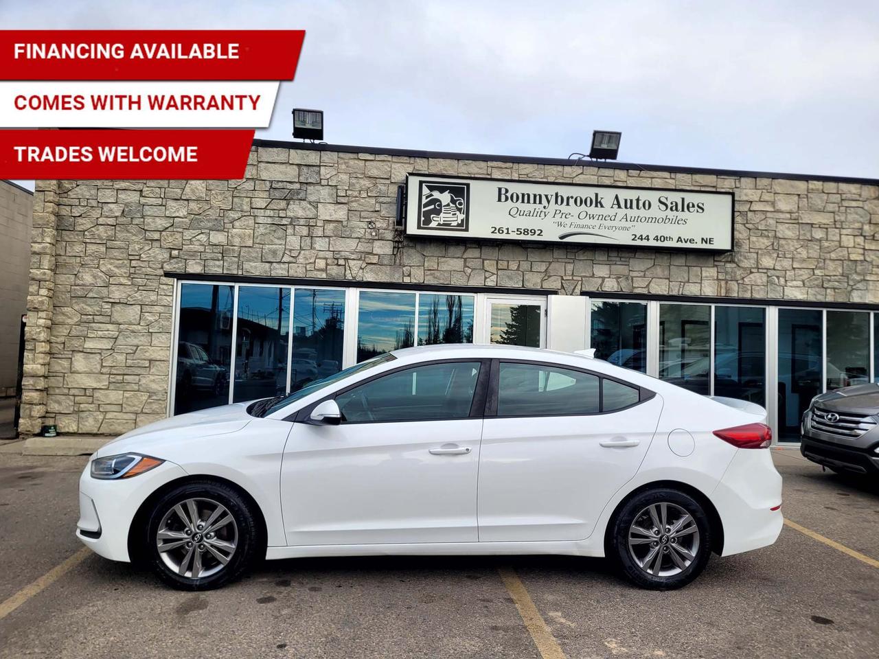 Need a vehicle that has style? Look at our Pre-Owned 2017 HYUNDAI ELANTRA GL AUTOMATIC (Pictured in photo) Options include: Heated Seats, Keyless Entry, Bluetooth,  Power Mirrors, Power Locks, Power Windows. Blind spot indicators Am/Fm stereo Cd player  Rearview camera Heated steering wheel/Air /Tilt /Cruise comes with 6 month power train warranty with options to extend. Smooth ride at a great price thats ready for your test drive. Fully inspected and given a clean bill of health by our technicians. Fully detailed on the interior and exterior so it feels like new to you. There should never be any surprises when buying a used car, thats why we share our Mechanical Fitness Assessment and Carfax with our customers, so you know what we know. Bonnybrook Auto sales is helping thousands find quality used vehicles at prices they can afford. If you would like to book a test drive, have questions about a vehicle or need information on finance rates, give our friendly staff a call today! Bonnybrook auto sales is proudly one of the few car dealerships that have been serving Calgary for over Twenty years. /TRADE INS WELCOMED/ Amvic Licensed Business.  Due to the recent increase for used vehicles.  Demand and sales combined with  the U.S exchange rate, a lot  vehicles are being exported to the U.S. We are in need of pre-owned vehicles. We give top dollar for your trades.  We also purchas