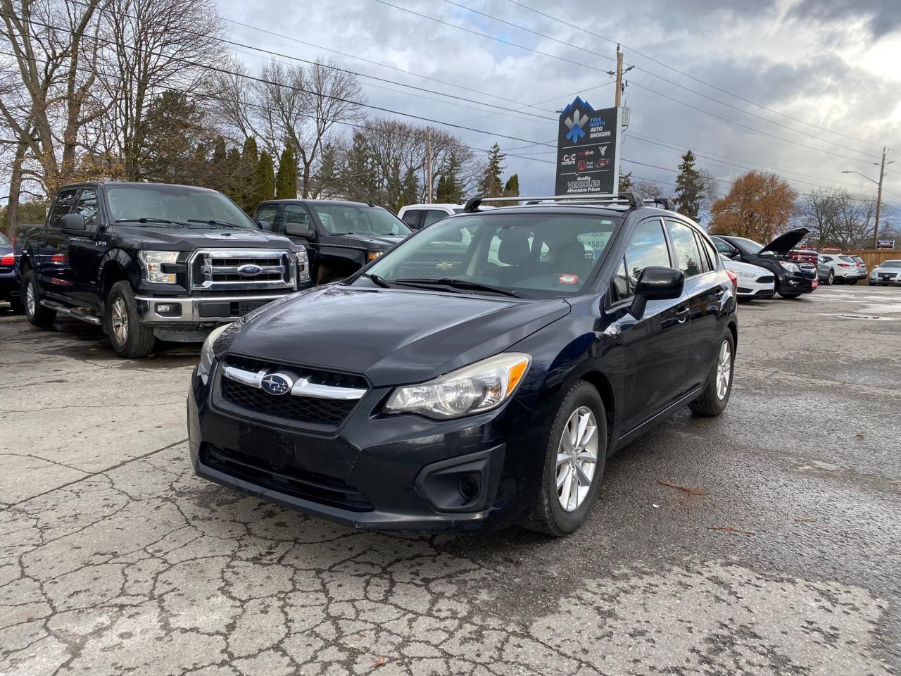 2014 Subaru Impreza 5dr HB CVT 2.0i w/Touring Pkg Photo