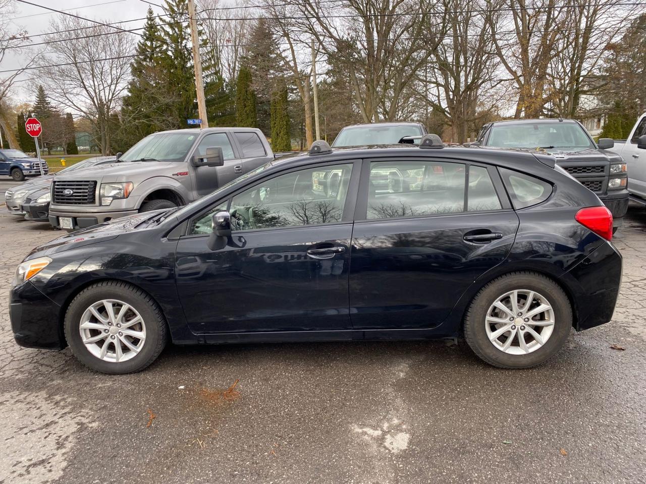 2014 Subaru Impreza 5dr HB CVT 2.0i w/Touring Pkg Photo