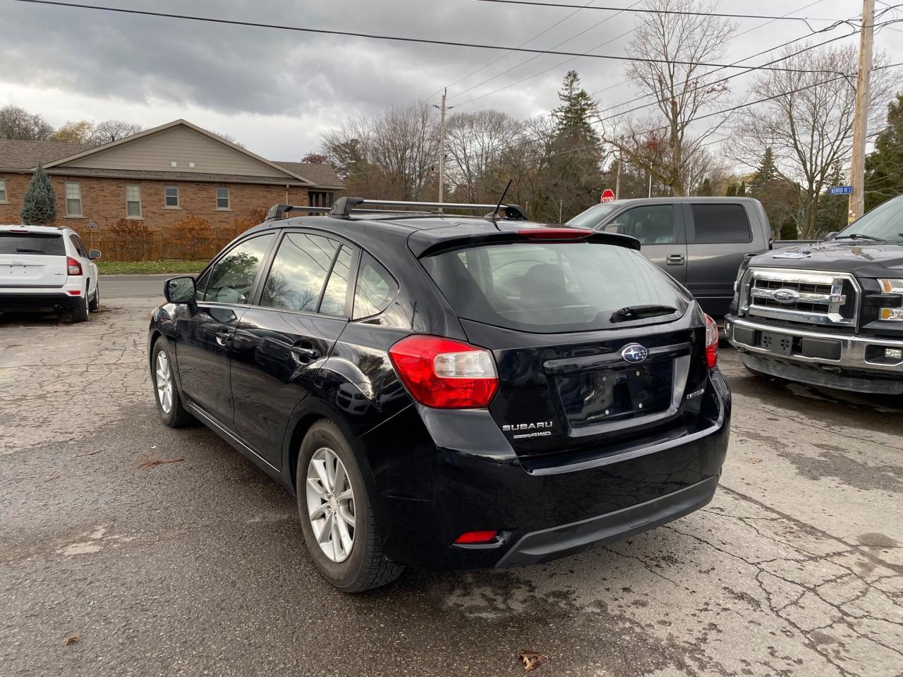 2014 Subaru Impreza 5dr HB CVT 2.0i w/Touring Pkg Photo