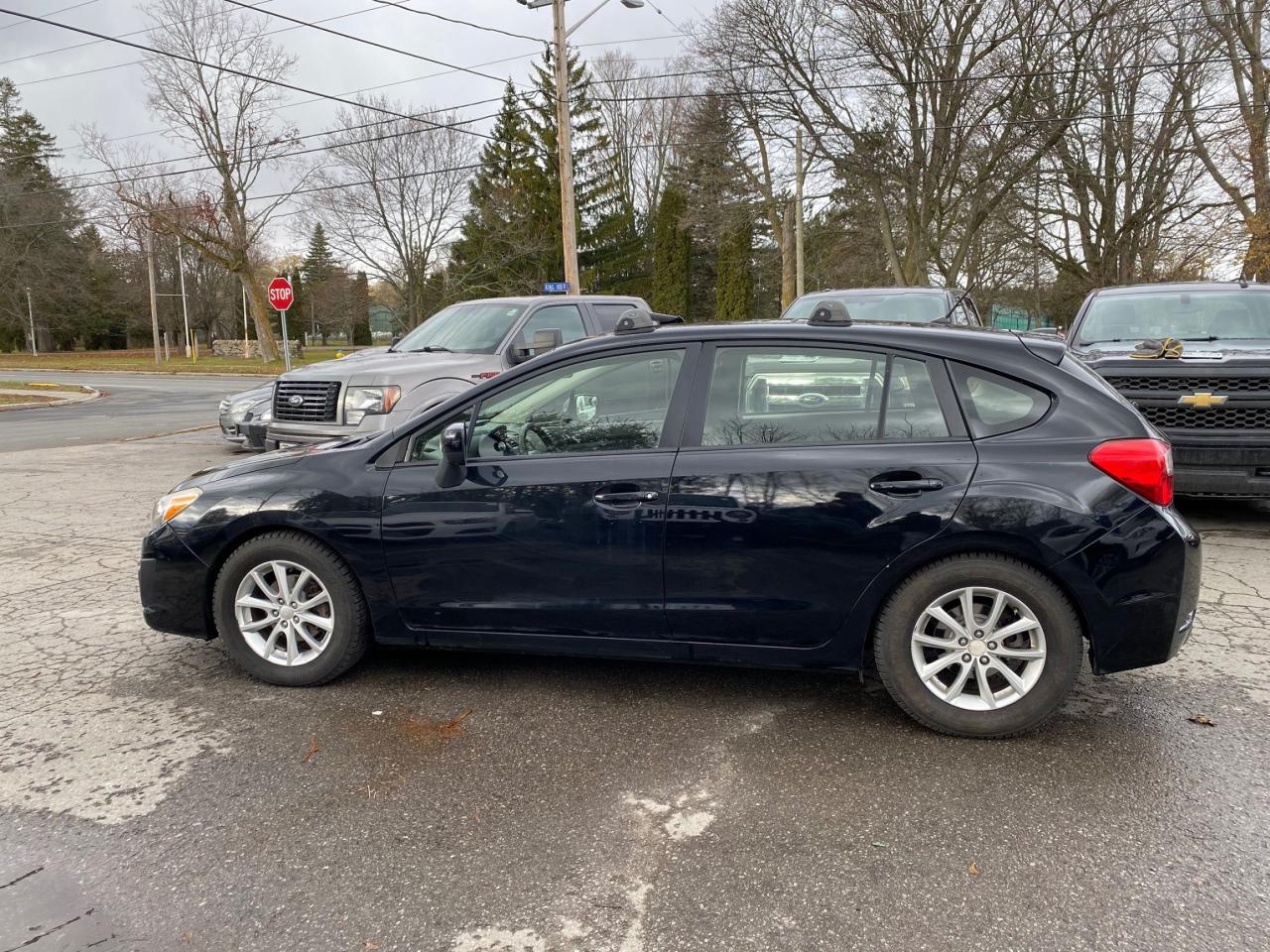 2014 Subaru Impreza 5dr HB CVT 2.0i w/Touring Pkg Photo