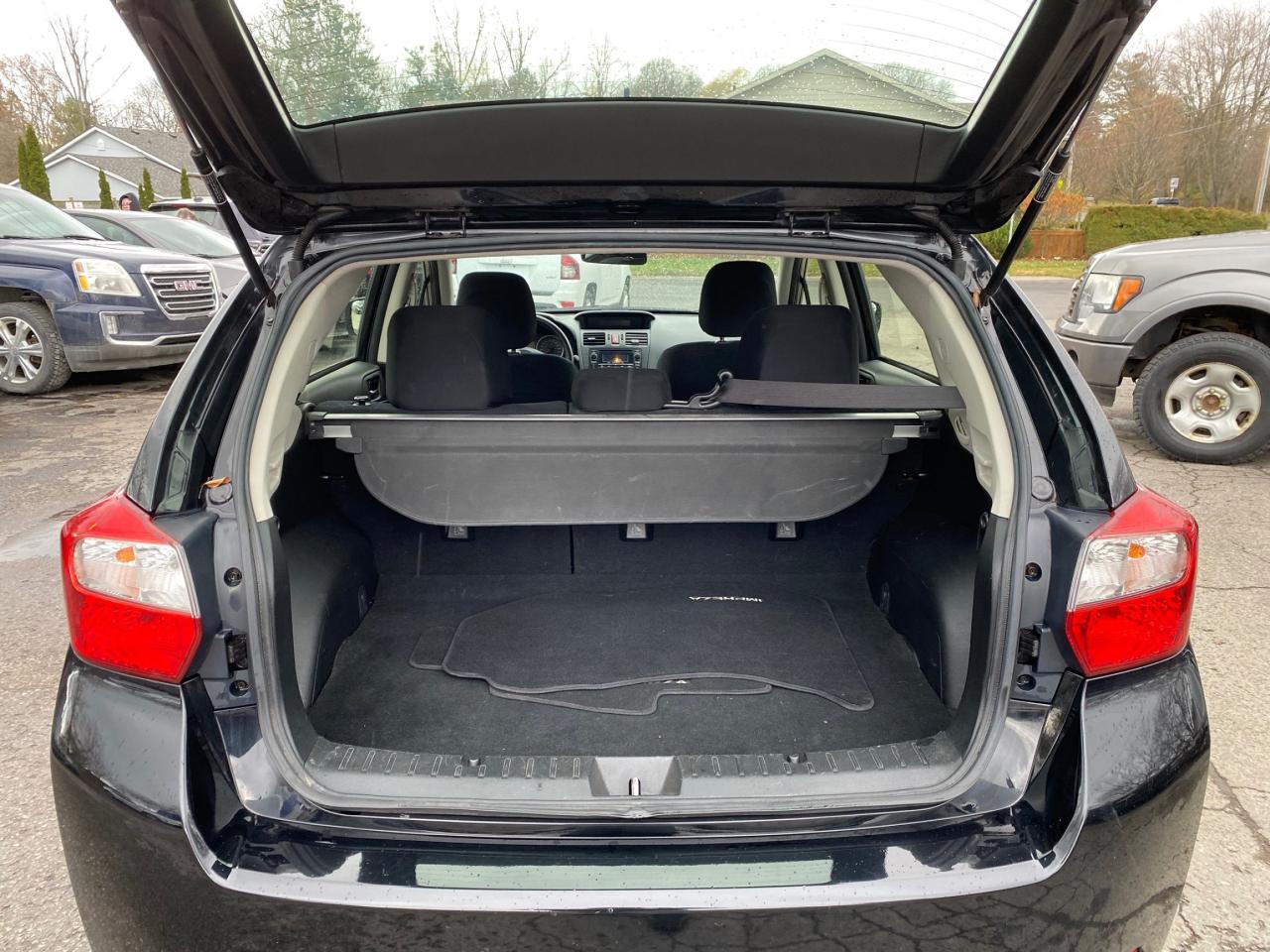 2014 Subaru Impreza 5dr HB CVT 2.0i w/Touring Pkg Photo