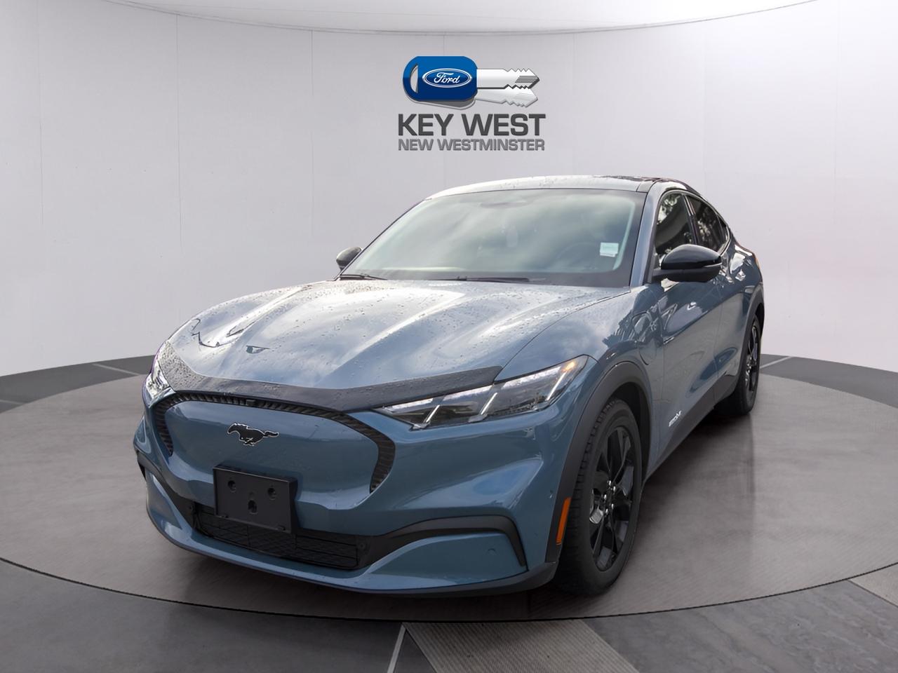 <p>Looking for a stylish and efficient electric SUV? Check out this used 2024 Ford Mustang Mach-E Select, now available at Key West Ford! This eye-catching blue crossover boasts a sleek design and is packed with features to enhance your driving experience. With only 15,225 KM on the odometer, this Mach-E is practically brand new and ready for adventure. Experience the future of driving with its smooth automatic transmission and rear-wheel drive, offering a comfortable and engaging ride.</p><p>&nbsp;</p><p>This Mach-E Select is loaded with technology and convenience features designed to make every journey enjoyable. From its advanced safety systems to its user-friendly infotainment, this SUV has it all. Youll appreciate the spacious interior, perfect for both daily commutes and weekend getaways. Dont miss your chance to own this exceptional electric vehicle. Visit Key West Ford today and take it for a test drive!</p><p>&nbsp;</p><p>Here are five standout features of this 2024 Ford Mustang Mach-E Select:</p><p><br><br></p><ul><li><strong>BLIS (Blind Spot Information System):</strong> Stay aware of your surroundings with this crucial safety feature, providing added confidence on the road.</li></ul><p>&nbsp;</p><ul><li><strong>Connected Navigation:</strong> Get where you need to go with ease, thanks to the integrated navigation system with voice activation.</li></ul><p>&nbsp;</p><ul><li><strong>Reverse Brake Assist:</strong> This feature helps you avoid collisions while backing up.</li></ul><p>&nbsp;</p><ul><li><strong>Digital Appearance:</strong> The digital appearance gives the vehicle a modern and sleek look.</li></ul><p>&nbsp;</p><ul><li><strong>Electric Power-Assist Speed-Sensing Steering:</strong> Enjoy effortless steering and enhanced control, making every drive a pleasure.</li></ul><p><br><br></p><p><strong><em>Powered by AutoIntelligence&trade;</em></strong><br>Vehicle information has been generated using artificial intelligence and is provided for informational purposes only. While efforts are made to ensure accuracy, please confirm all details directly with the dealer.</p><p>&nbsp;</p><p>Experience peace of mind with our Buy With Confidence program! This vehicle comes with a comprehensive mechanical and safety inspection, Carfax report, and full disclosure. We are committed to transparent pricing. The advertised price excludes fees: $699 Documentation, $349 Registration/Insurance Transfer, $695 Finance Administration Fee (if applicable), and taxes. As BCs #1 Volume Dealer and #1 for Customer Experience on DealerRater, we prioritize your satisfaction. See Key West Ford for complete details. Book your test drive today!&nbsp; Dealer #7485</p>