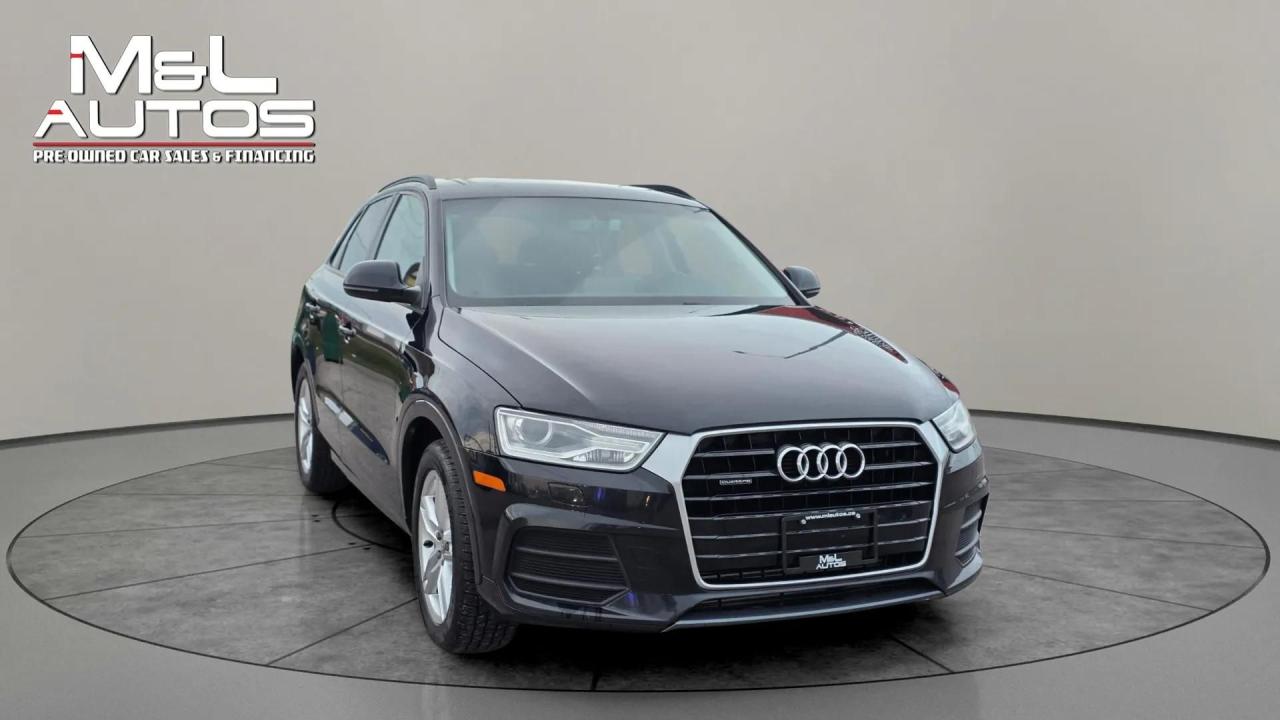 2016 Audi Q3 quattro 4dr 2.0T Komfort Photo2