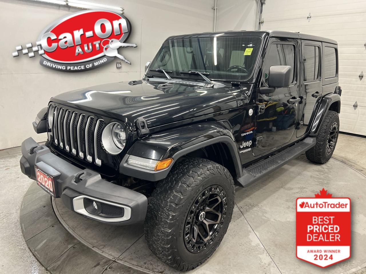 LOADED SAHARA 4 DOOR 4X4 NORTH EDITION!! Heated seats & steering, Android Auto/ Apple CarPlay, remote start, navigation, hard top, backup camera, running boards, rear mounted spare tire, tow package, off-road pages, premium Alpine audio system, dual-zone climate control, keyless entry w/ push start, power locks, power windows, power mirrors, automatic headlights, cruise control, auto-dimming rearview mirror, Bluetooth and Sirius XM!!