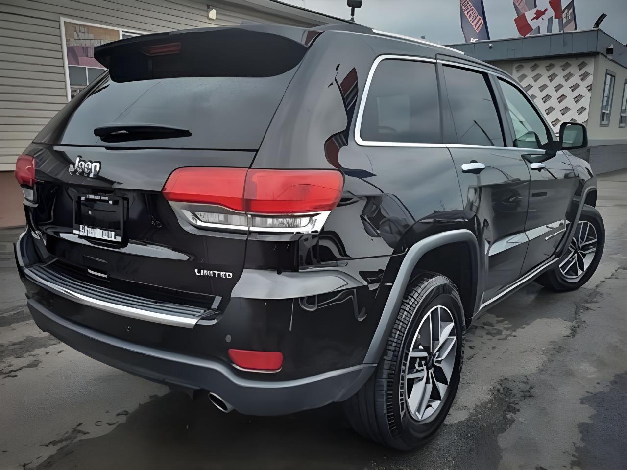 2019 Jeep Grand Cherokee NAV LEATHER PANO ROOF MINT! WE FINANCE ALL CREDIT! Photo