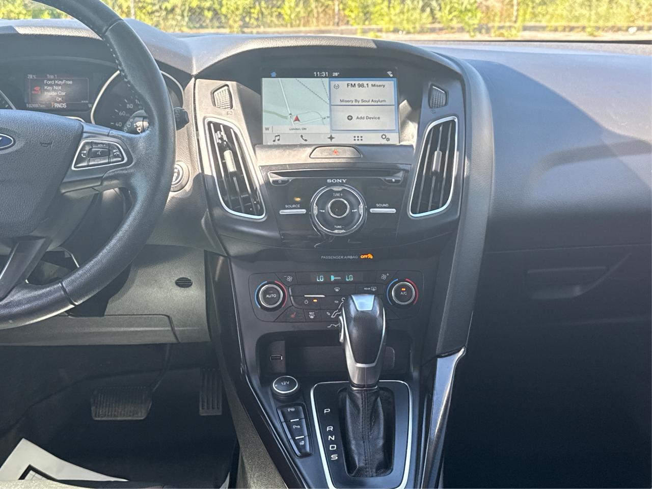 2016 Ford Focus LEATHER SUNROOF MINT! WE FINANCE ALL CREDIT! Photo