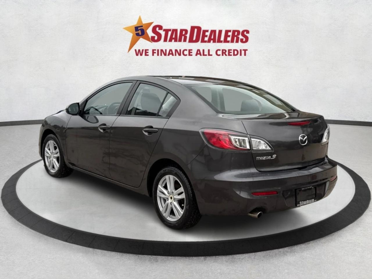 2013 Mazda MAZDA3 4dr Sdn Man GX CLEAN MUST SEE WE FINANCE ALL CREDT Photo