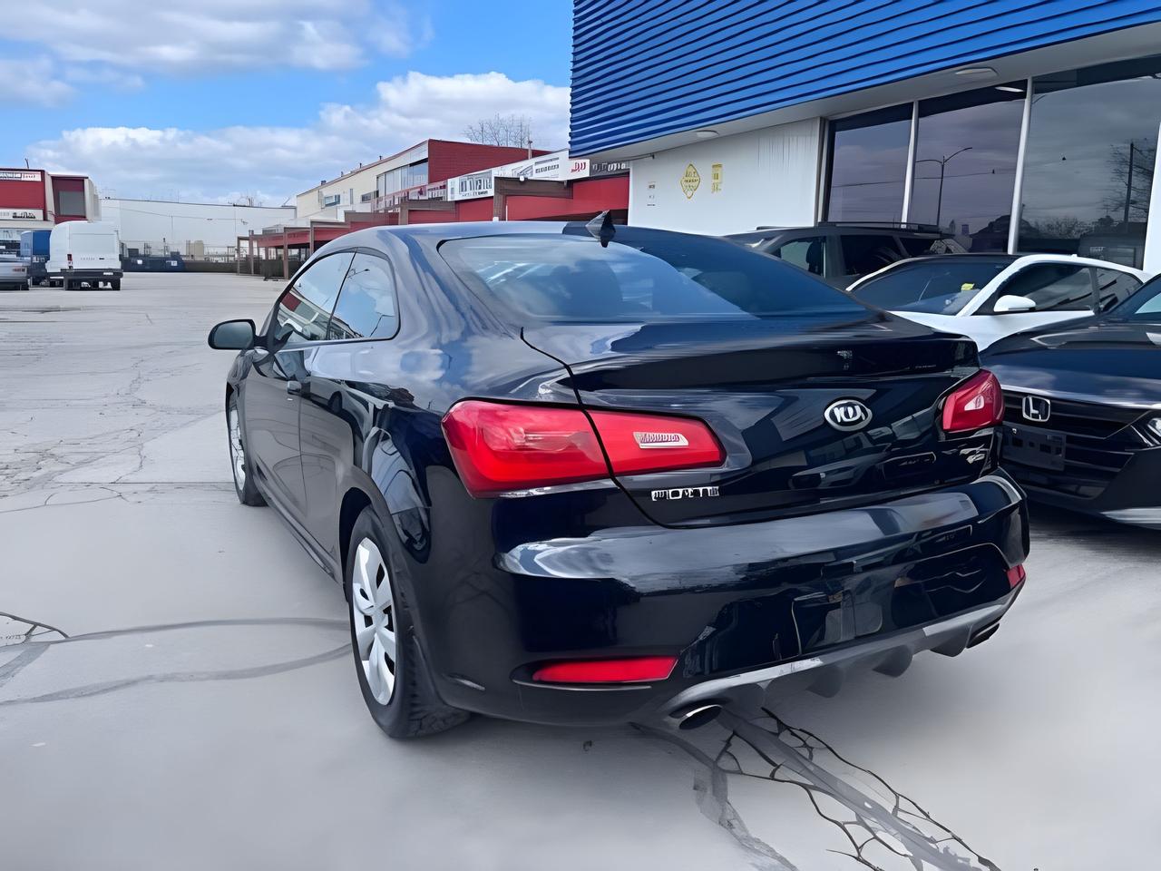 2016 Kia Forte Koup 2dr Cpe  SX SUPER NICE CAR WE FINANCE ALL CREDIT! Photo