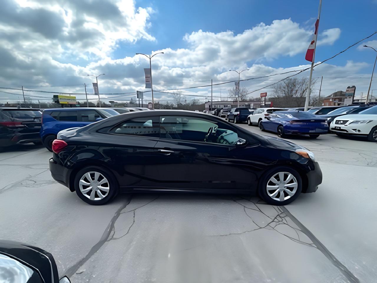 2016 Kia Forte Koup 2dr Cpe  SX SUPER NICE CAR WE FINANCE ALL CREDIT! Photo