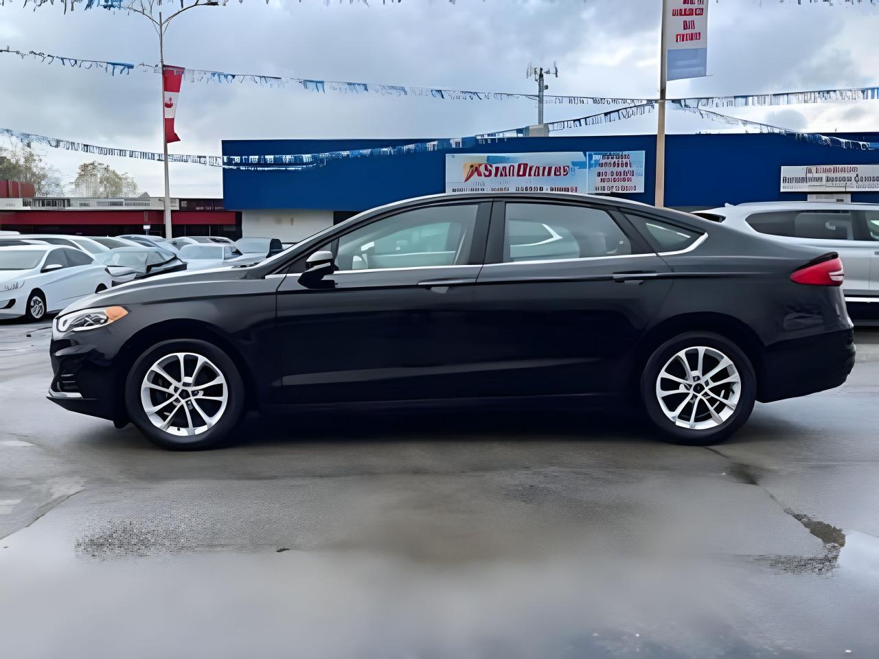 2020 Ford Fusion Hybrid SEL HYBRID NAV LEATHER LOW KM WE FINANCE ALL CREDI Photo2