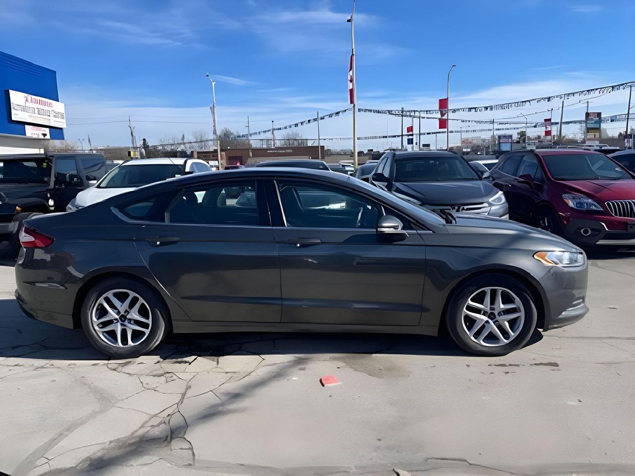 2015 Ford Fusion EXCELLENT CONDITION! ! WE FINANCE ALL CREDIT Photo