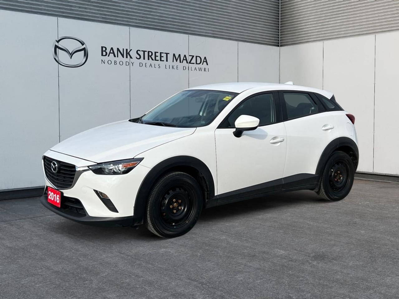 Introducing the 2016 Mazda CX-3 GX in an impressive AWD drive train, offering remarkable handling and control in various driving conditions. This SUV stands out with its carefully crafted exterior that blends sophistication with a sporty edge, making every journey a stylish one. Inside, the Mazda CX-3 GX is designed for comfort and convenience, featuring thoughtful styling and a host of features that make every drive enjoyable. The cabin is equipped with air conditioning to keep you comfortable, while power windows add convenience at your fingertips. The keyless entry ensures ease of access, while the ample interior space makes it a practical choice for day-to-day activities. Equipped with a backup camera and brake assist, this vehicle prioritizes your safety during every drive. The Bluetooth connection allows seamless integration with your devices, so you can stay connected without taking your hands off the wheel, alongside the reliability of cruise control for longer journeys. Ideal for tech-savvy individuals who value modern connectivity and families seeking a reliable vehicle for both city life and outdoor adventures, the Mazda CX-3 GX promises to meet varied lifestyle needs. Contact us today for more information or to schedule a test drive. Experience the blend of technology, safety, and style that the Mazda CX-3 GX offers.