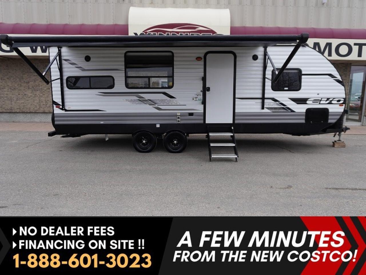 *** Dealer arranged financing on site! Quick, Simple,  no calls or waiting on bank appointments required!! ***   NO ADMINISTRATION FEES!!

2023 Forest River EVO 2460RKX &ndash; Family Adventure Ready!

Ready for family road trips, weekend getaways, or summer adventures? The 2023 Forest River EVO 2460RKX makes traveling easy, comfortable, and fun. With a private front queen bedroom, a U-shaped dinette that converts into extra sleeping space, and a cozy sofa, there&rsquo;s room for the whole family to relax, unwind and enjoy the fireplace!

Built for comfort in any season, the EVO includes air conditioning, a furnace, and heated tanks. Pass-through storage, overhead cabinets, and a bedroom wardrobe keep all your gear organized. Lightweight and easy to tow, it&rsquo;s designed for families who want adventure without compromise.

Hit the road and create unforgettable family memories with this 2023 Forest River EVO 2460RKX! The private front queen bedroom offers a cozy retreat for restful nights, while the U-shaped dinette slide-out provides a spacious area for meals, games, or movie nights. The convertible dinette and sofa add extra sleeping space for kids or guests, making it easy to accommodate the whole family.

The rear kitchen is equipped with full-size appliances, plenty of counter space, and ample storage, allowing you to prepare family meals just like at home. The modern bathroom features a step-in shower, foot-flush toilet, and storage for towels and essentials, keeping everyone comfortable on your travels. Outside, the power awning creates a perfect spot to relax in the shade, enjoy a BBQ, or spend quality time with family outdoors.

Lightweight and easy to tow, the Forest River EVO 2460RKX has a smart layout designed for family comfort, with all-season features including heated tanks and solid insulation. Whether it&rsquo;s a weekend trip to the lake or a summer road trip across the country, this travel trailer makes every adventure easier, more comfortable, and more fun for the entire family.

- Lightweight and easy to tow
- Smart layout designed for family comfort
- All-season features including heated tanks and solid insulation

Whether it&rsquo;s a weekend trip to the lake or a summer road trip across the country, this Forest River EVO makes every adventure easier and more fun for the whole family.

***EXTENDED WARRANTY options available to choose from to protect your RV and your wallet. (HUGE VALUE!!!) Zero down financing OAC with very Low monthly payments avail. Please see dealer for details. Trades accepted. View at Winnipeg West Automotive Group, 5195 Portage Ave. Dealer permit # 4365, Call now 1-(888) 601-3023.