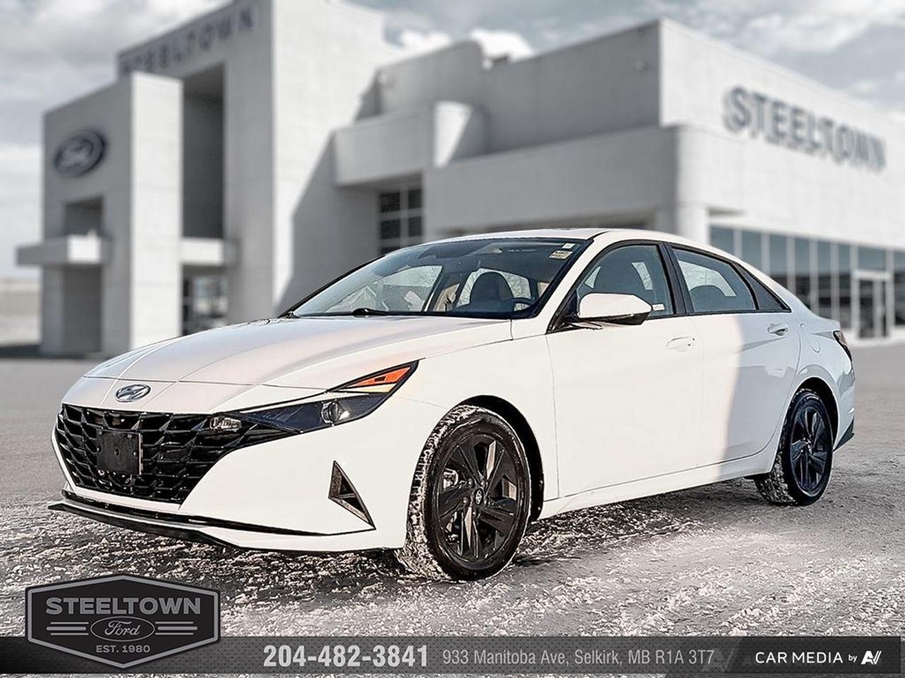 <b>Lane Keep Assist,  Heated Seats,  Android Auto,  Apple CarPlay,  Aluminum Wheels!</b><br> <br> We value your TIME, we wont waste it or your gas is on us!   We offer extended test drives and if you cant make it out to us we will come straight to you!<br><br><br> <br>This 2022 Hyundai Elantra is for sale today in Selkirk. <br> <br>This 2022 Elantra was made to be the sharpest compact sedan on the road. With tons of technology packed into the spacious and comfortable interior, along with bold and edgy styling inside and out, this family sedan makes the unexpected your daily driver. This sedan has 73,830 km. Its White in colour. It has an Automatic transmission and is powered by a 147HP 2.0L 4 Cylinder Engine. <br> <br> Our Elantras trim level is Preferred. This Preferred Elantra is a great choice if you want a more convenient car that comes with proximity keys that allow hands free cargo access, and a safer drive with blind spot and rear collision assist. This Elantra is also equipped with an advanced safety suite including lane keep assist, forward collision assist, driver monitoring, and automatic highbeams. The incredible feature list continues with heated power seats for comfort while voice activated, touch screen infotainment including wireless connectivity with Android Auto, Apple CarPlay, and Bluetooth keeps you connected. Aluminum wheels and gorgeous styling make sure you stand out in a crowd while heated power side mirrors, remote keyless entry, and a rear view camera make every day easier. This vehicle has been upgraded with the following features: Lane Keep Assist, Heated Seats, Android Auto, Apple CarPlay, Aluminum Wheels, Remote Keyless Entry, Touch Screen.<br> <br>To apply right now for financing use this link: <a href=http://www.steeltownford.com/?https://CreditOnline.dealertrack.ca/Web/Default.aspx?Token=bf62ebad-31a4-49e3-93be-9b163c26b54c&La target=_blank>http://www.steeltownford.com/?https://CreditOnline.dealertrack.ca/Web/Default.aspx?Token=bf62ebad-31a4-49e3-93be-9b163c26b54c&La</a><br><br> <br/><br> Buy this vehicle now for the lowest bi-weekly payment of <b>$134.31</b> with $0 down for 96 months @ 8.99% APR O.A.C. ( Plus applicable taxes -  Platinum Shield Protection & Tire Warranty included   / Total cost of borrowing $8039   ).  See dealer for details. <br> <br>Family owned and operated in Selkirk for 35 Years.  <br>Steeltown Ford is located just 20 minutes North of the Perimeter Hwy, with an onsite banking center that offers free consultations. <br>Ask about our special dealer rates available through all major banks and credit unions.<br><br><br>Steeltown Ford Protect Plus includes:<br>- Life Time Tire Warranty <br>Cars cost less in Selkirk <br><br>Dealer Permit # 1039<br><br><br> Come by and check out our fleet of 110+ used cars and trucks and 180+ new cars and trucks for sale in Selkirk.  o~o