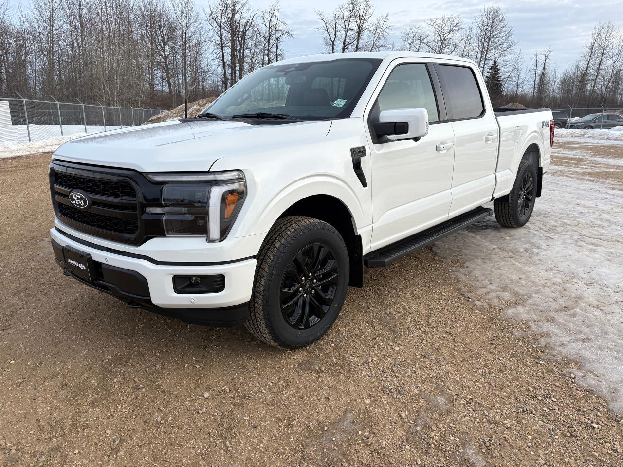 <h3 data-start=166 data-end=227><strong data-start=170 data-end=227>2025 Ford F-150 Lariat &ndash; Star White Metallic Tri-Coat</strong></h3><p data-start=228 data-end=296><strong data-start=228 data-end=296>SuperCrew&reg; | 6.5 Box | FX4&reg; Off-Road | Black Appearance Package</strong></p><p data-start=298 data-end=545>The <strong data-start=302 data-end=328>2025 Ford F-150 Lariat</strong> blends premium comfort, advanced technology, and legendary capability. Finished in stunning <strong data-start=421 data-end=453>Star White Metallic Tri-Coat</strong>, this SuperCrew&reg; delivers both head-turning style and serious performance for work or play.</p><hr data-start=547 data-end=550><h3 data-start=552 data-end=581><strong data-start=556 data-end=581>Exterior & Capability</strong></h3><p data-start=582 data-end=1114>This F-150 features <strong data-start=602 data-end=629>LED projector headlamps</strong>, <strong data-start=631 data-end=648>LED fog lamps</strong>, <strong data-start=650 data-end=667>LED taillamps</strong>, <strong data-start=669 data-end=695>daytime running lights</strong>, and <strong data-start=701 data-end=744>20 gloss black painted aluminum wheels</strong> as part of the <strong data-start=760 data-end=796>Lariat&reg; Black Appearance Package</strong>. A <strong data-start=800 data-end=827>fully boxed steel frame</strong>, <strong data-start=829 data-end=843>6-1/2 box</strong>, <strong data-start=845 data-end=888>power tailgate lock with remote release</strong>, <strong data-start=890 data-end=913>bed utility package</strong>, and <strong data-start=919 data-end=945>Class IV trailer hitch</strong> ensure maximum versatility. The <strong data-start=978 data-end=1003>FX4&reg; Off-Road Package</strong> adds confidence on rough terrain, while <strong data-start=1044 data-end=1068>Trailer Sway Control</strong> and <strong data-start=1073 data-end=1090>Tow/Haul mode</strong> make towing effortless.</p><hr data-start=1116 data-end=1119><h3 data-start=1121 data-end=1154><strong data-start=1125 data-end=1154>Interior Comfort & Luxury</strong></h3><p data-start=1155 data-end=1628>Inside, enjoy premium <strong data-start=1177 data-end=1213>ActiveX&reg; seating (40/console/40)</strong> with <strong data-start=1219 data-end=1272>power, heated, ventilated, and memory driver seat</strong>, <strong data-start=1274 data-end=1315>power lumbar for driver and passenger</strong>, <strong data-start=1317 data-end=1338>heated rear seats</strong>, and a <strong data-start=1346 data-end=1371>heated steering wheel</strong>. Comfort is elevated with <strong data-start=1398 data-end=1438>dual-zone electronic climate control</strong>, <strong data-start=1440 data-end=1479>power-adjustable pedals with memory</strong>, <strong data-start=1481 data-end=1504>auto-dimming mirror</strong>, <strong data-start=1506 data-end=1565>power sliding rear window with defrost and privacy tint</strong>, and the <strong data-start=1575 data-end=1600>Mobile Office Package</strong> for productivity on the go.</p><hr data-start=1630 data-end=1633><h3 data-start=1635 data-end=1668><strong data-start=1639 data-end=1668>Technology & Connectivity</strong></h3><p data-start=1669 data-end=2046>Stay connected with <strong data-start=1689 data-end=1729>SYNC&reg; 4 on a massive 12 touchscreen</strong>, <strong data-start=1731 data-end=1766>12 digital productivity screen</strong>, <strong data-start=1768 data-end=1797>B&O&reg; premium audio system</strong>, <strong data-start=1799 data-end=1820>360-degree camera</strong>, <strong data-start=1822 data-end=1848>reverse sensing system</strong>, <strong data-start=1850 data-end=1874>remote vehicle start</strong>, and <strong data-start=1880 data-end=1901>FordPass Connect&trade;</strong>. This truck is <strong data-start=1917 data-end=1940>BlueCruise Equipped</strong>, including a <strong data-start=1954 data-end=1986>90-day trial and 1-year plan</strong>, bringing hands-free highway driving to your daily commute.</p><hr data-start=2048 data-end=2051><h3 data-start=2053 data-end=2087><strong data-start=2057 data-end=2087>Safety & Driver Assistance</strong></h3><p data-start=2088 data-end=2479>Equipped with <strong data-start=2102 data-end=2134>Ford Co-Pilot360&trade; technology</strong>, including <strong data-start=2146 data-end=2203>Pre-Collision Assist with Automatic Emergency Braking</strong>, <strong data-start=2205 data-end=2228>Lane Keeping System</strong>, <strong data-start=2230 data-end=2264>BLIS&reg; with Cross-Traffic Alert</strong>, <strong data-start=2266 data-end=2290>Reverse Brake Assist</strong>, <strong data-start=2292 data-end=2318>post-collision braking</strong>, <strong data-start=2320 data-end=2364>AdvanceTrac&reg; with Roll Stability Control</strong>, <strong data-start=2366 data-end=2392>Safety Canopy&reg; airbags</strong>, and <strong data-start=2398 data-end=2426>tire pressure monitoring</strong>&mdash;this F-150 prioritizes peace of mind on every drive.</p><hr data-start=2481 data-end=2484>