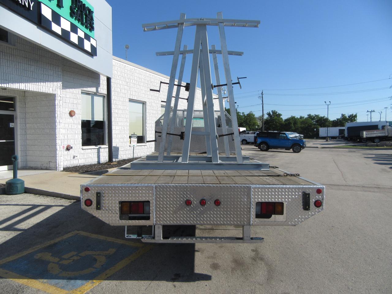 2020 Isuzu NRR DIESEL WITH 20 FT ALUMINUM FLAT DECK & SLAB RACK Photo