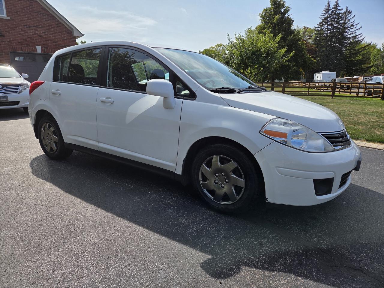 2012 Nissan Versa 5dr HB I4 Auto 1.8 S, Drives Great, Must See! Photo