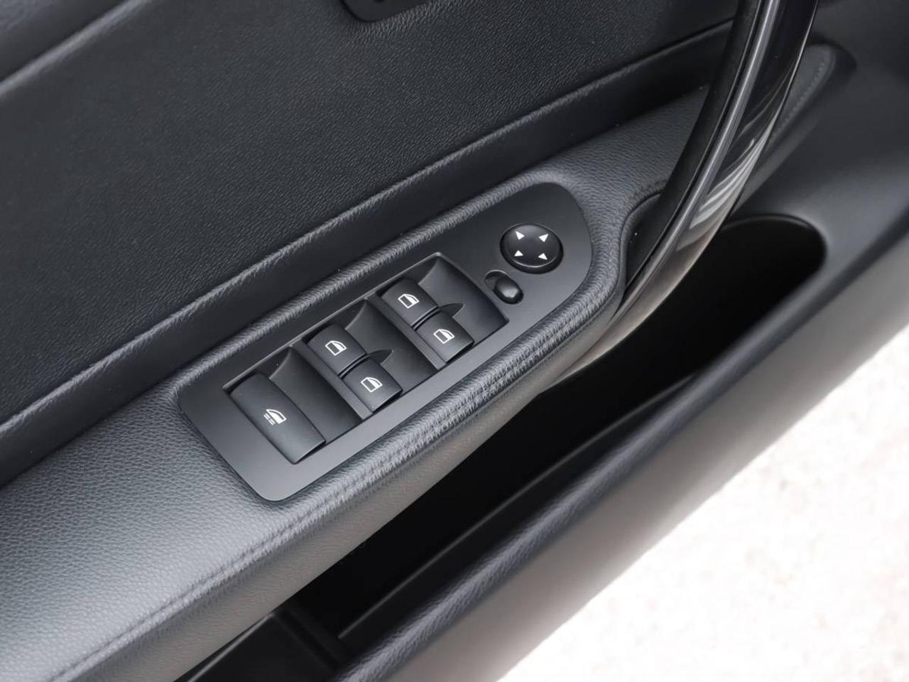 2012 BMW 1 Series 2DR CABRIOLET 128I Photo