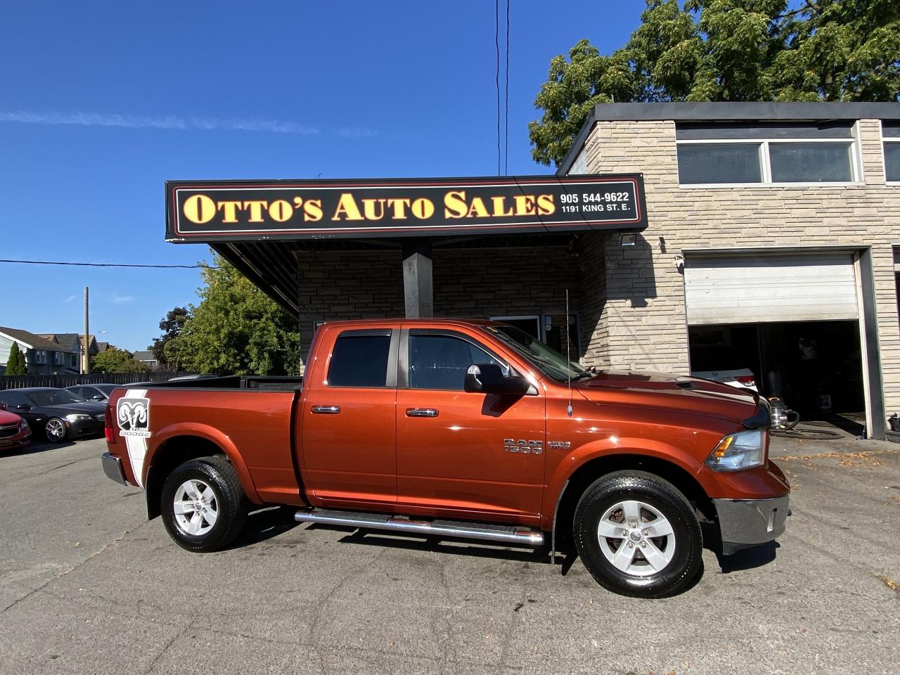 2013 RAM 1500 4WD Quad Cab 140.5  Outdoorsman Photo0