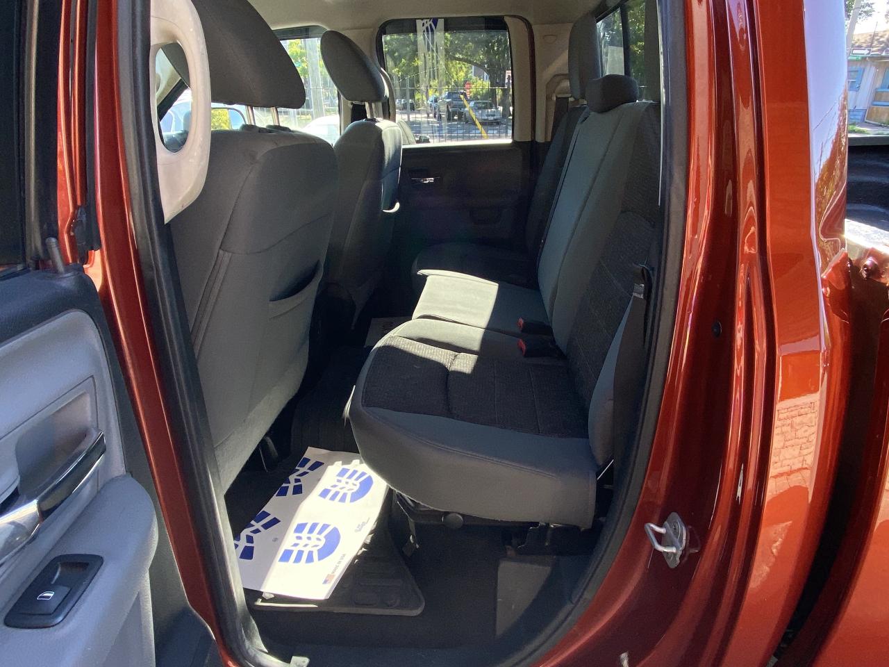 2013 RAM 1500 4WD Quad Cab 140.5  Outdoorsman Photo