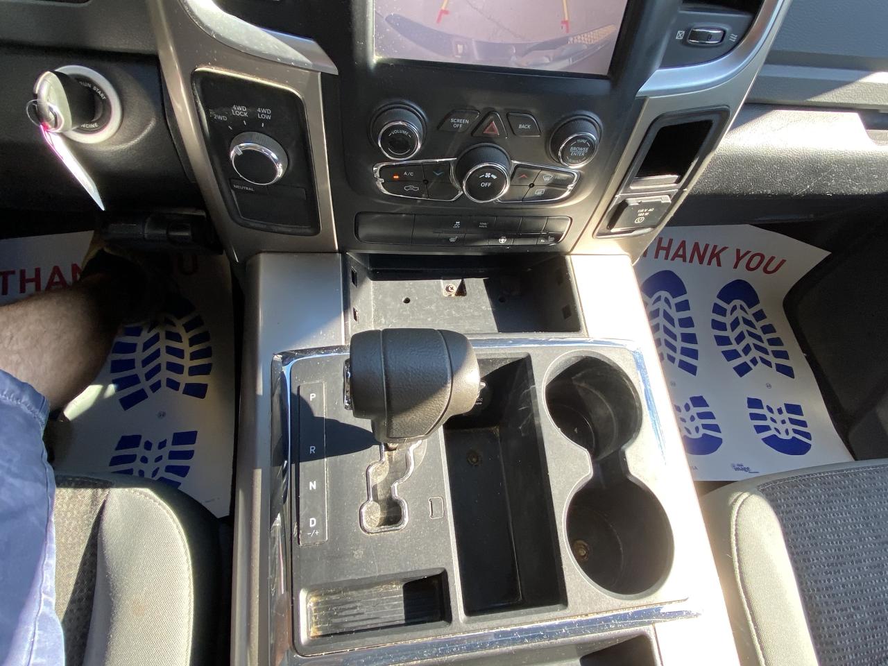 2013 RAM 1500 4WD Quad Cab 140.5  Outdoorsman Photo