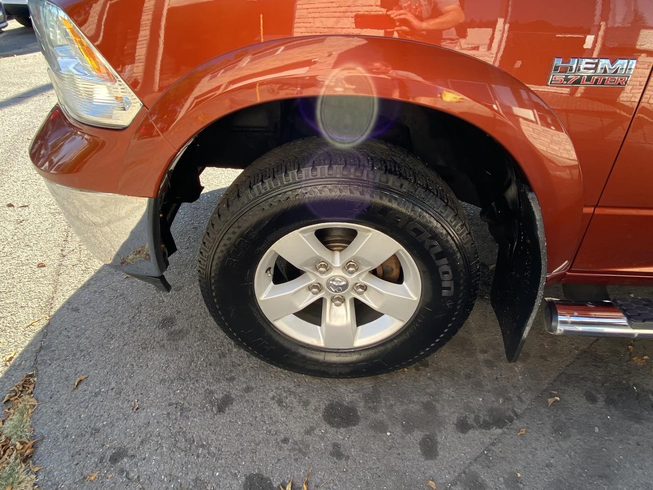 2013 RAM 1500 4WD Quad Cab 140.5  Outdoorsman Photo