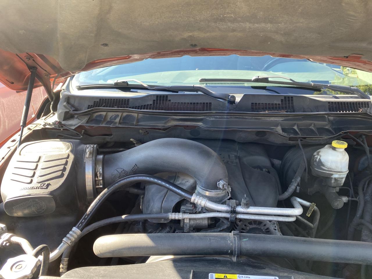 2013 RAM 1500 4WD Quad Cab 140.5  Outdoorsman Photo