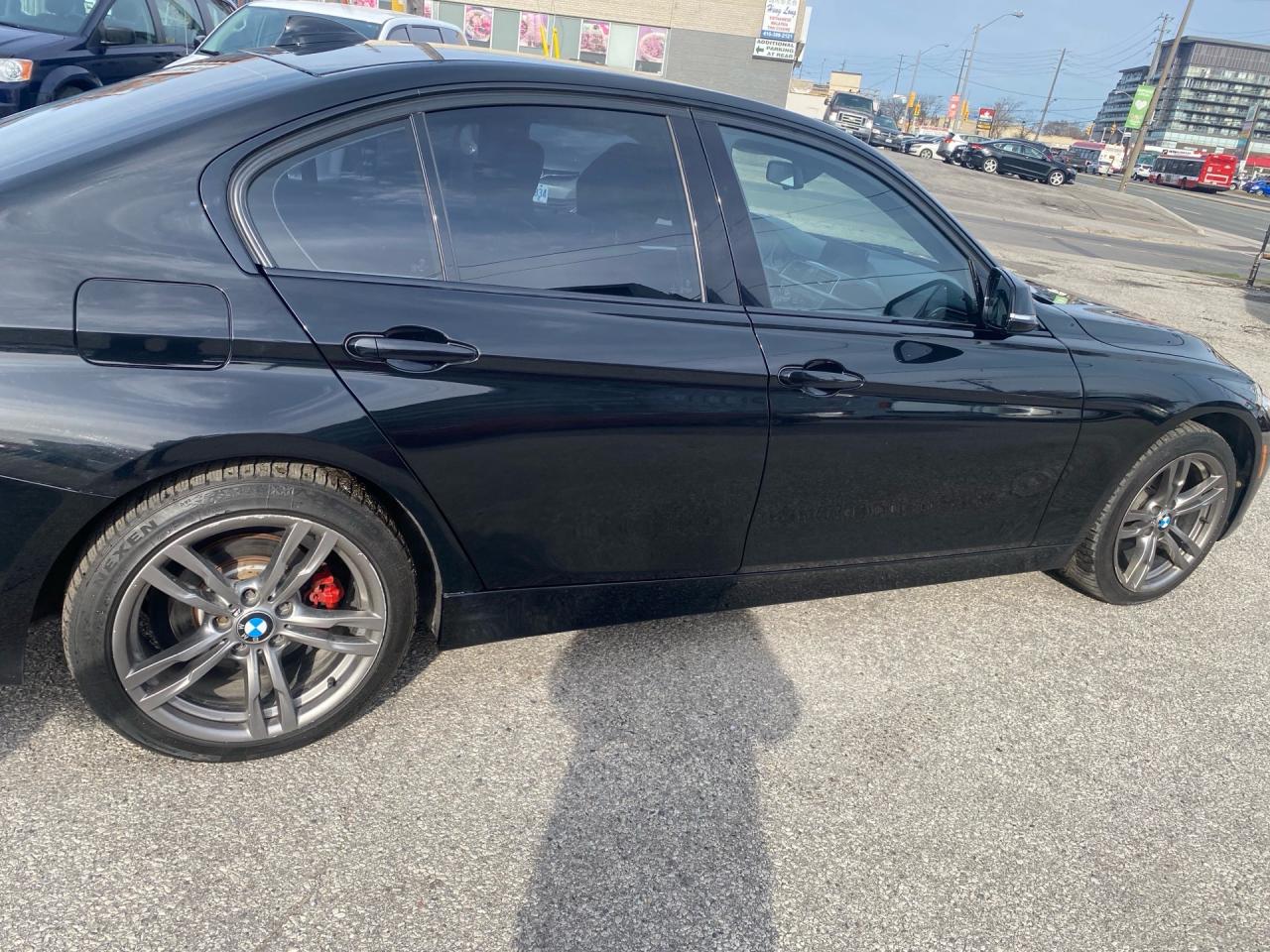 2017 BMW 3 Series 4dr Sdn 320i xDrive AWD Photo